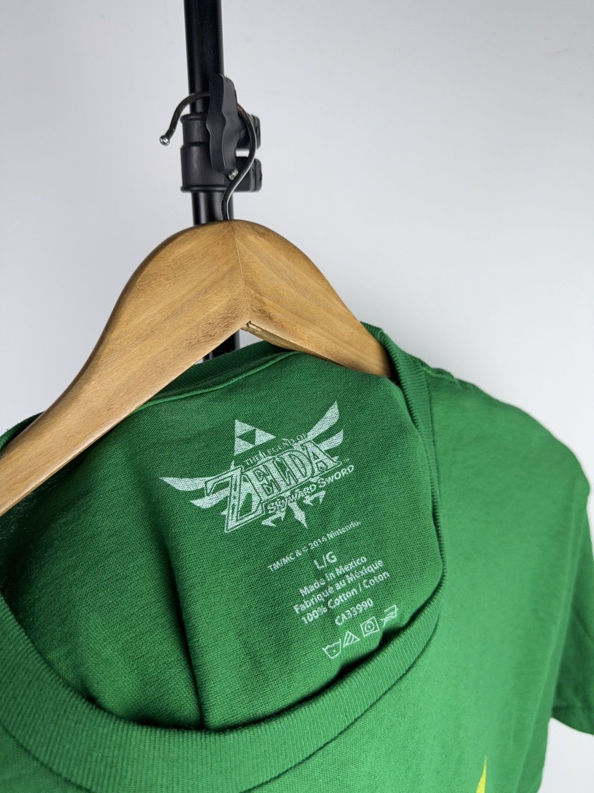 Nintendo 2016 Game Zelda Skyward Sword Hylian Crest Green Tee L Size US L / EU 52-54 / 3 - 6 Thumbnail