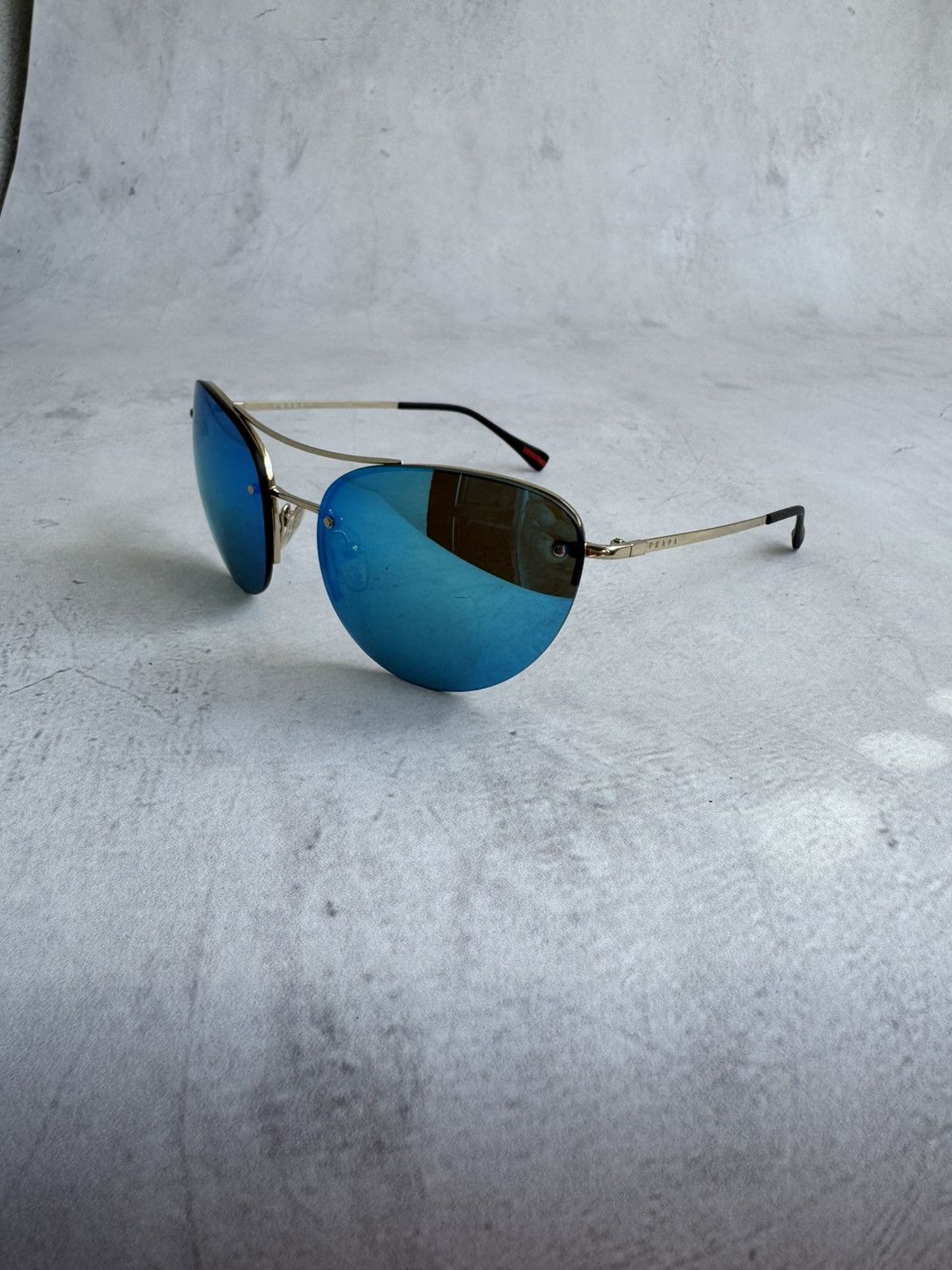 Prada Prada Sunglasses SPS 51R Rimless Shield Blue Mirror Size ONE SIZE - 1 Thumbnail