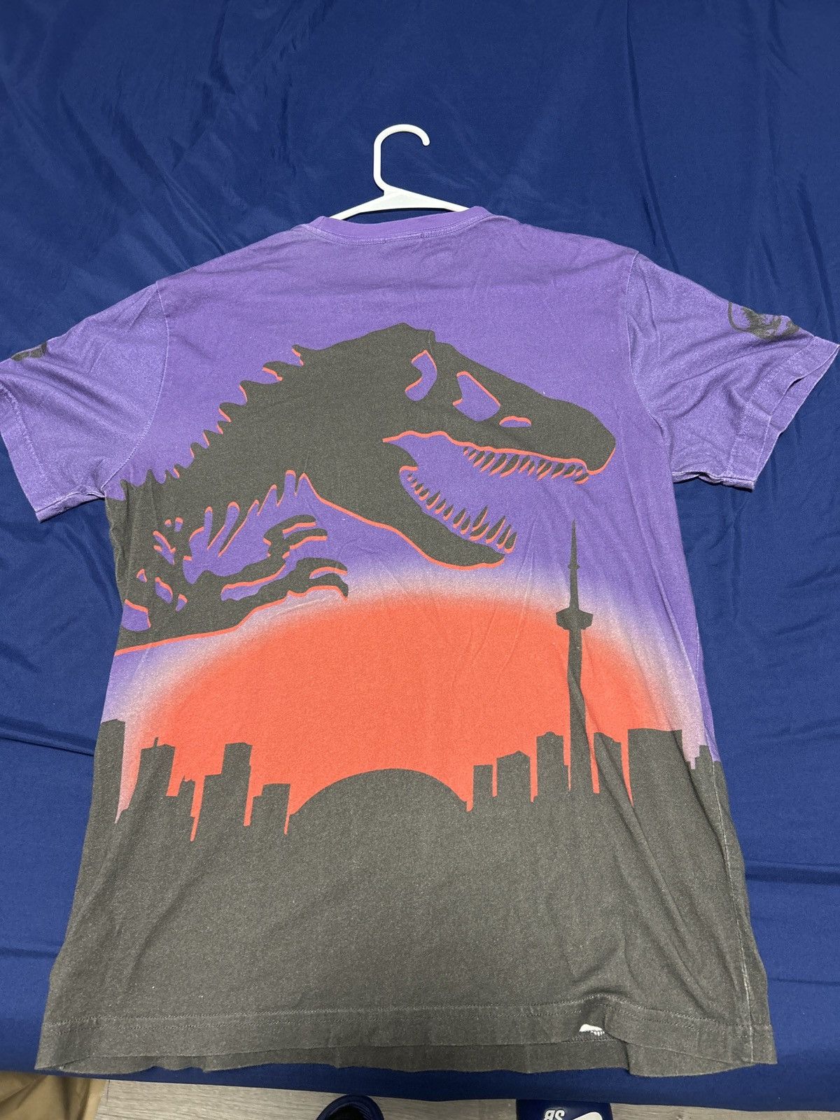 October's Very Own × Vintage OVO Toronto Raptors Jurassic Park skyline tee size small Size US S / EU 44-46 / 1 - 2 Thumbnail