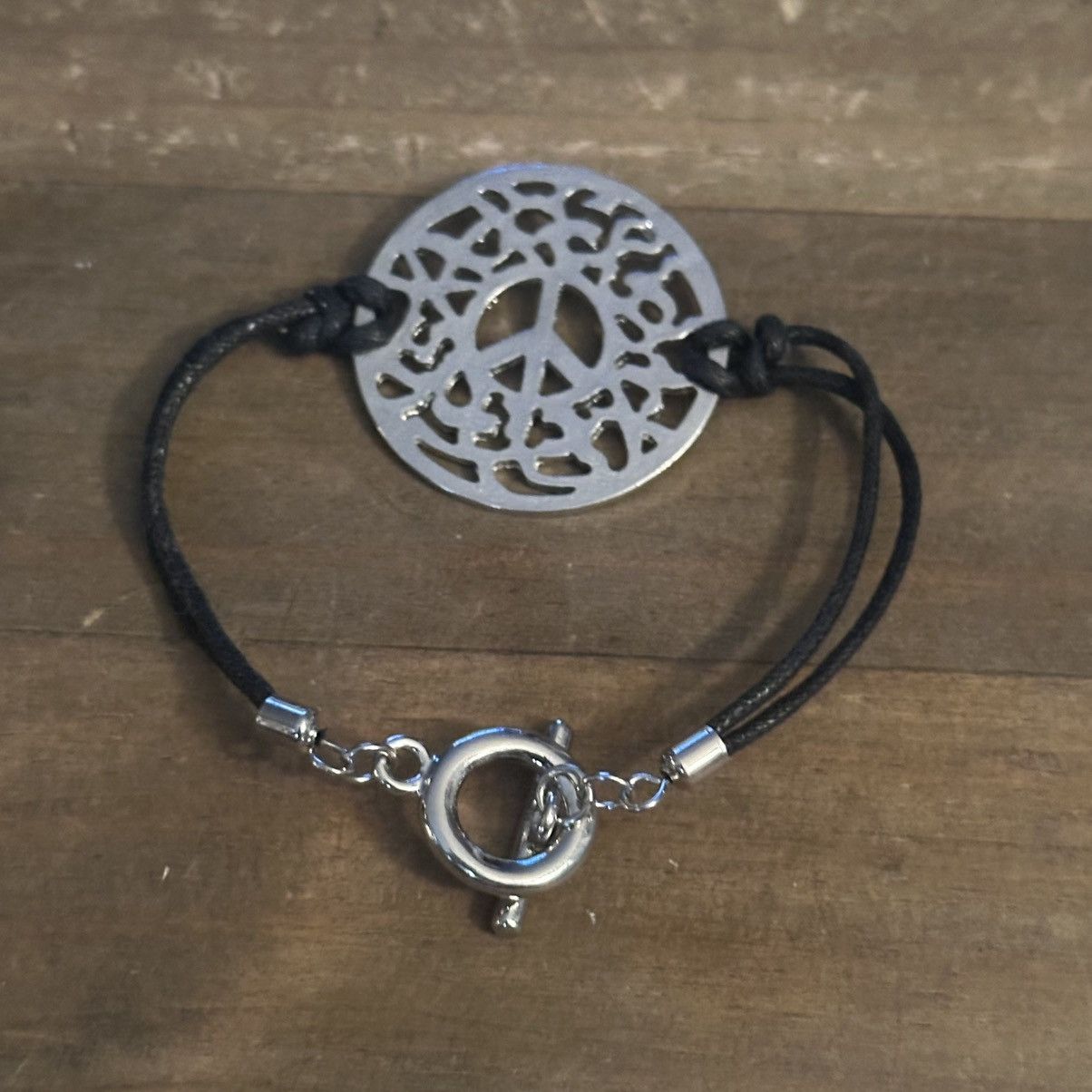 Other Silver tone filigree Peace cord toggle bracelet Size ONE SIZE - 2 Thumbnail