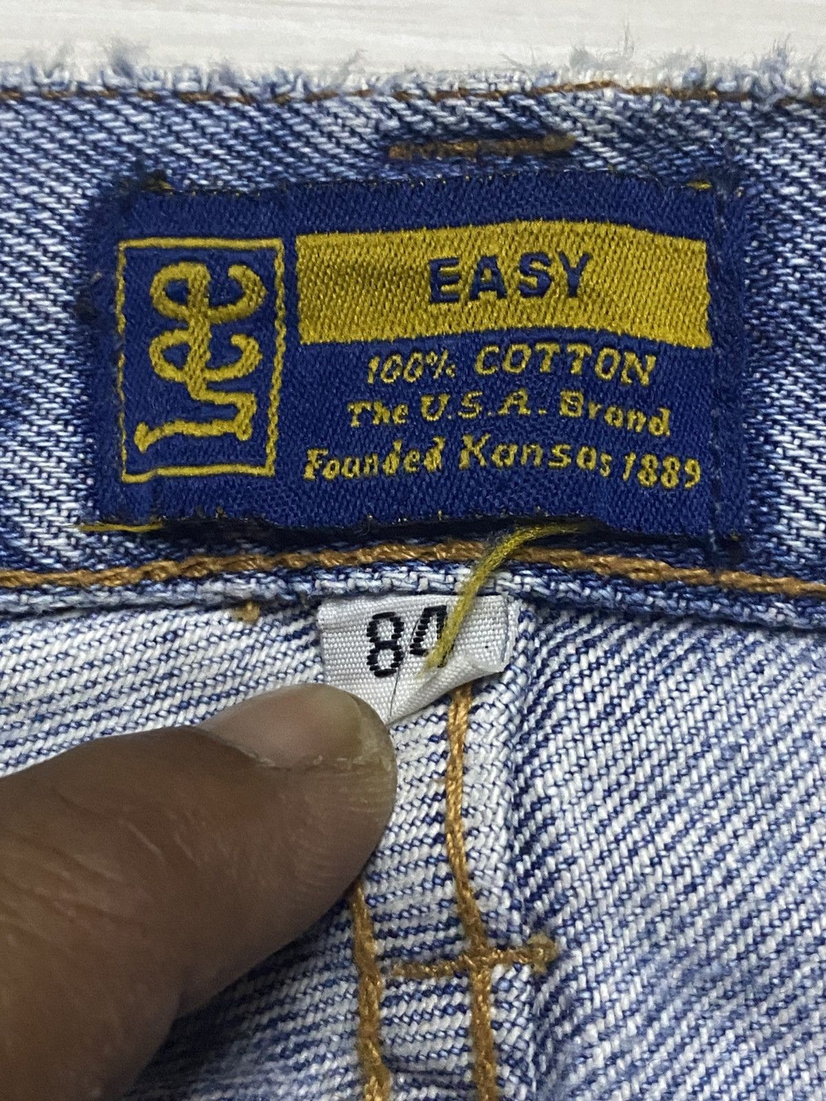 Vintage Lee Founded Kansas Light Wash Distressed Slim Jeans