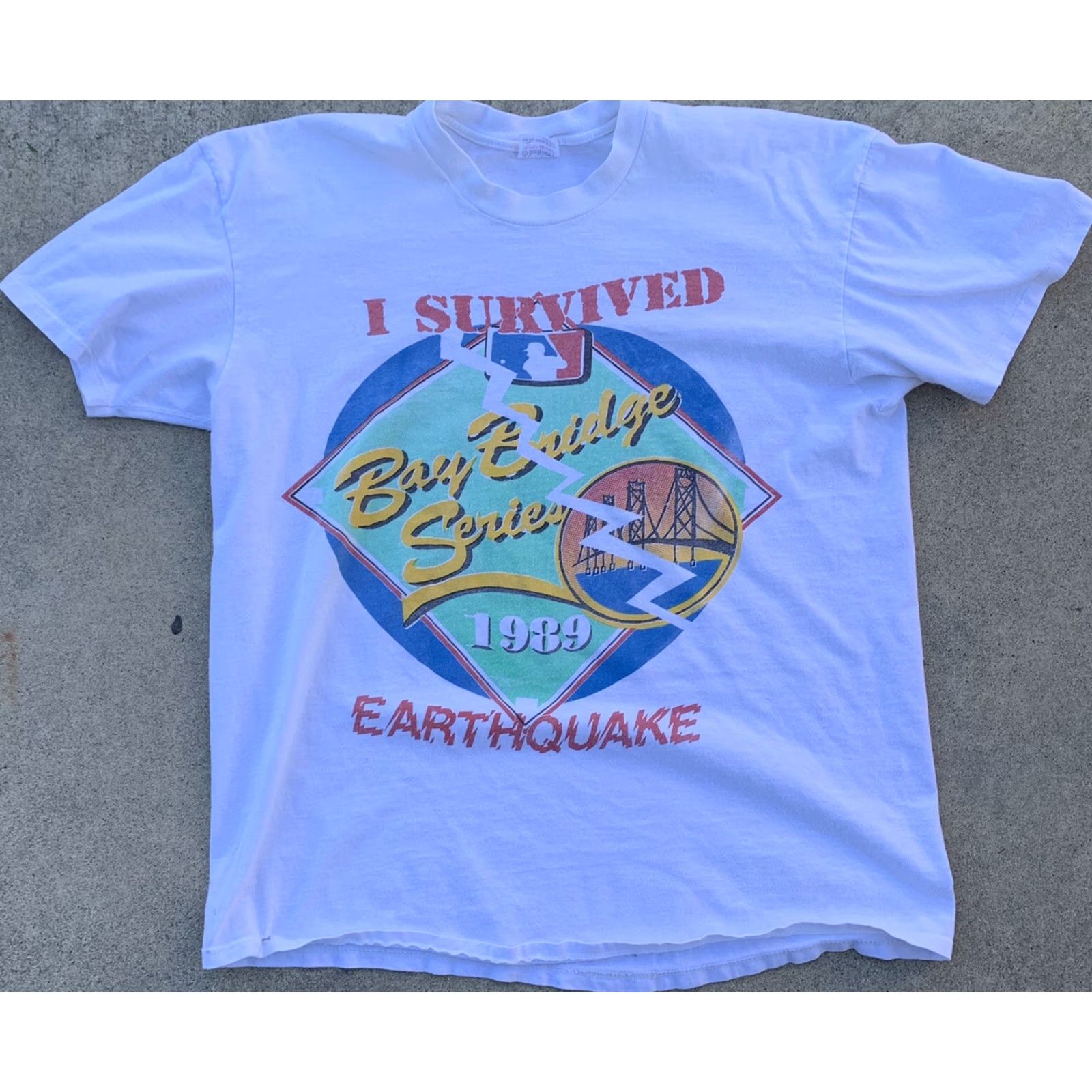 Vintage VINTAGE I Survived Bay Bridge Series 1989 Earthquake World Series t-shirt XL Shirt Men White 1989 Earthquake World Series A’s Giants Graphic Tee Size US XL / EU 56 / 4 - 5 Thumbnail
