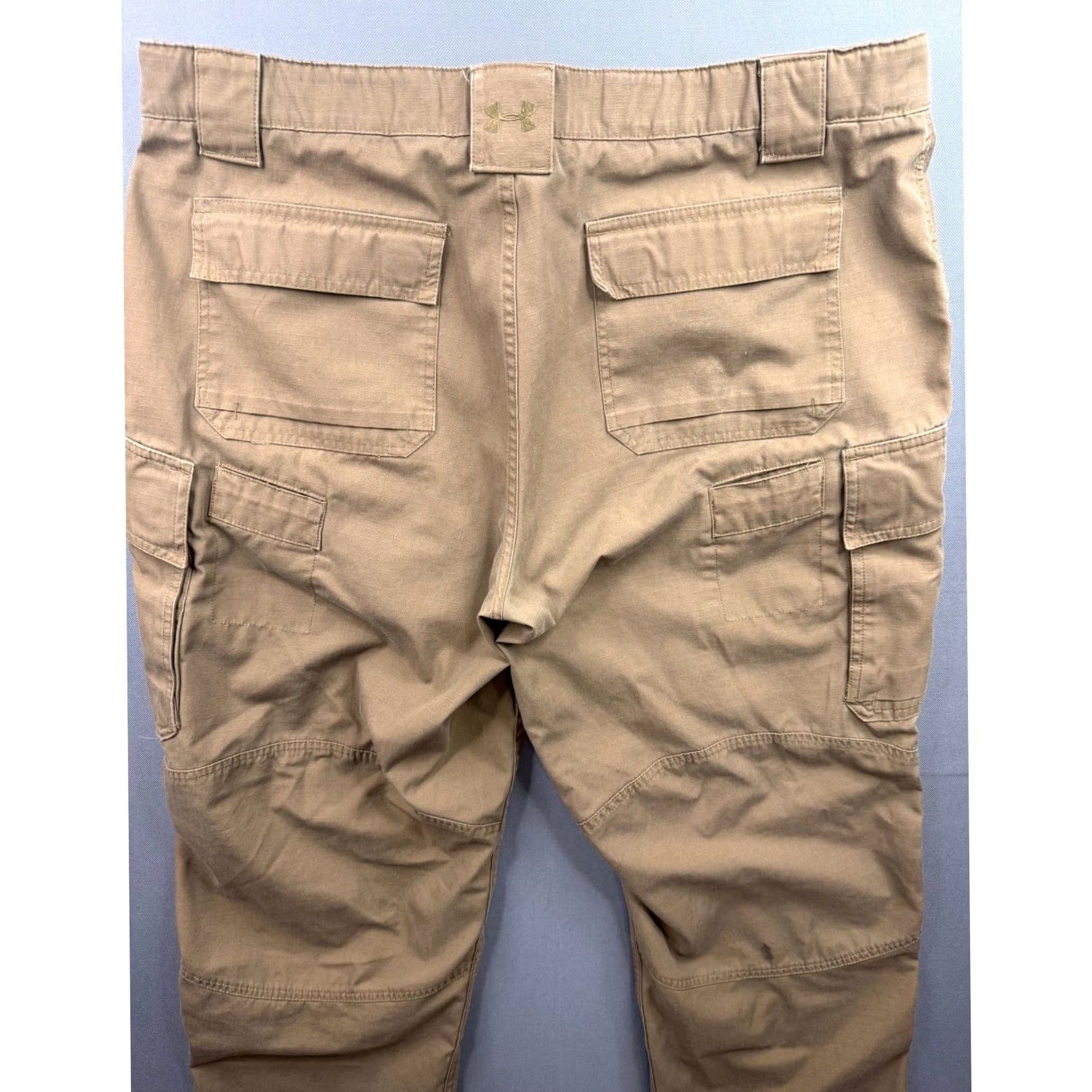 Under Armour Brand: Explicitly includes "Under Armour Size US 38 / EU 54 - 7 Thumbnail