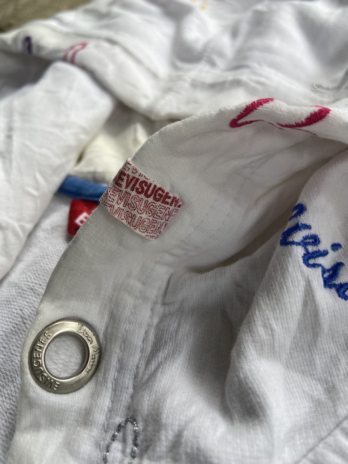 Evisu full-zip hoodie multicolored seagull and logo pattern.