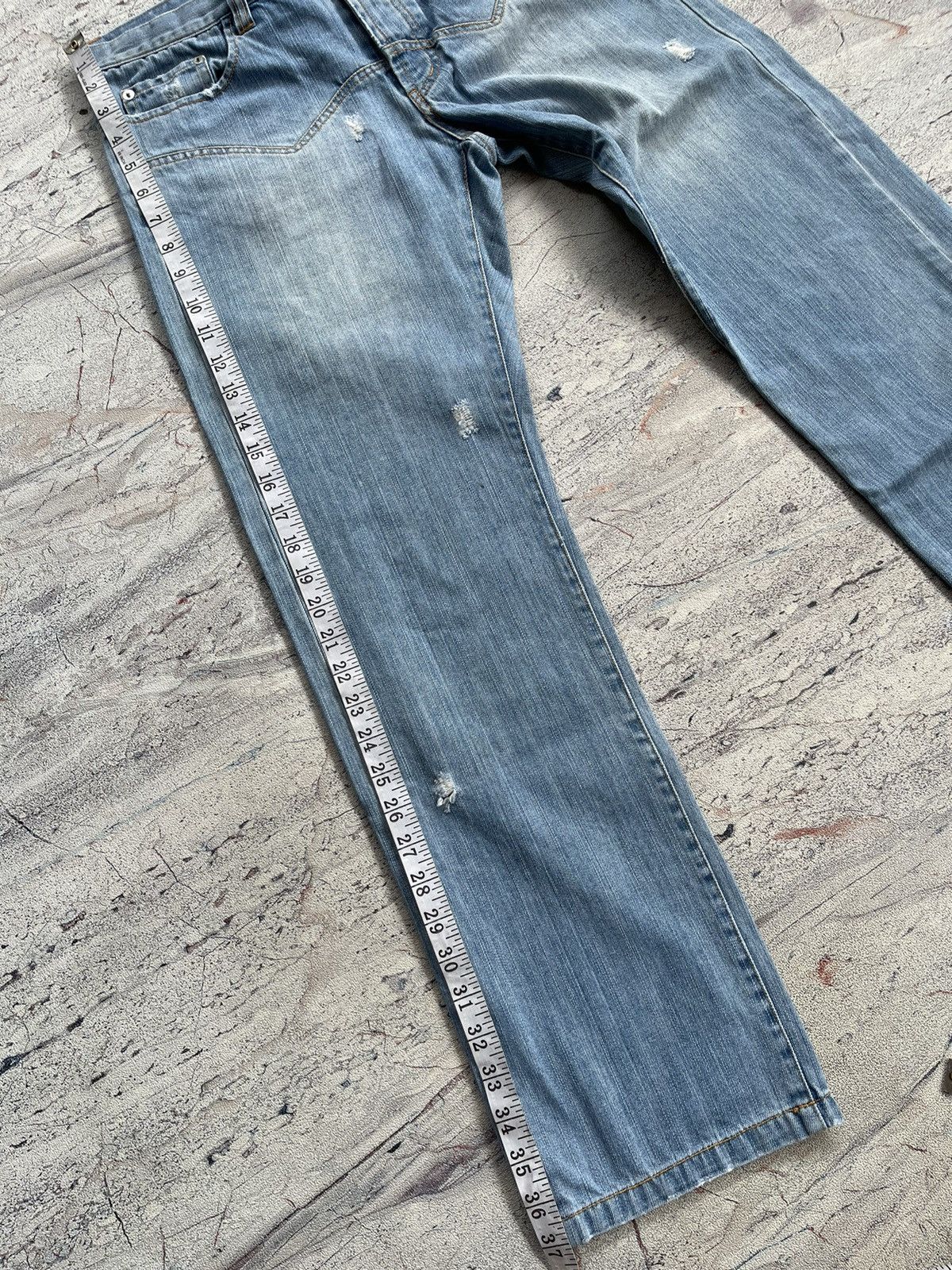 Sunao kuwahara distressed jeans by issey miyake