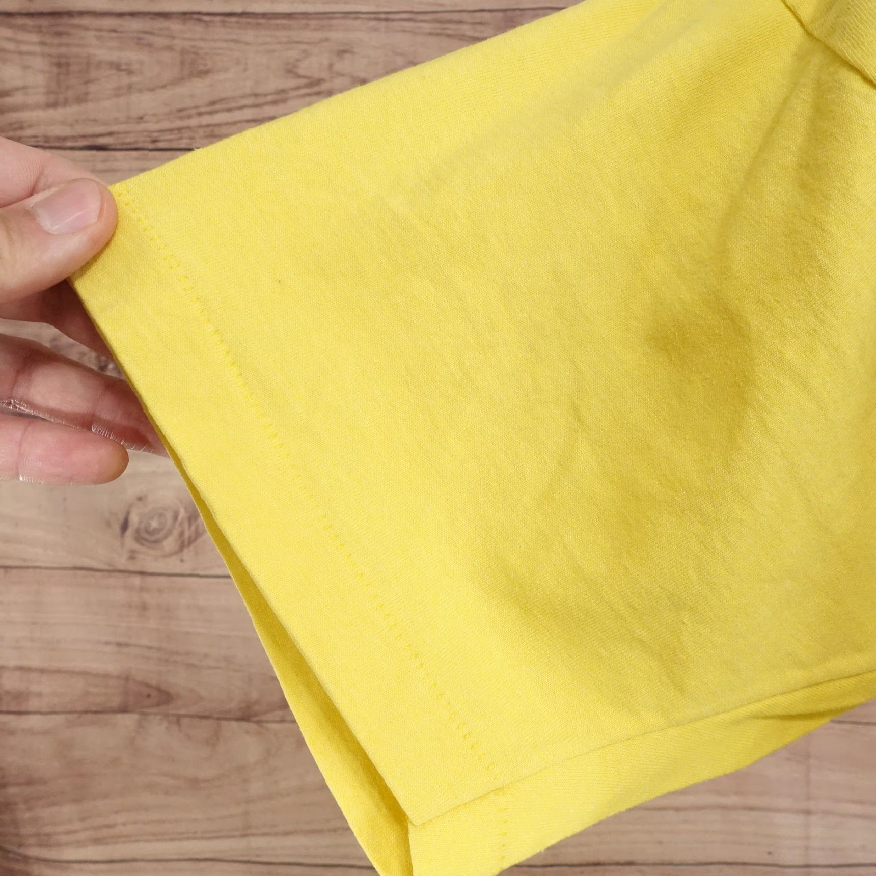 Fruit Of The Loom VINTAGE Fruit of the Loom Yellow T-Shirt XL Unisex Short Sleeve Hug A Rug Carpet Discount St Charles MO USA Mens Size US XL / EU 56 / 4 - 7 Thumbnail