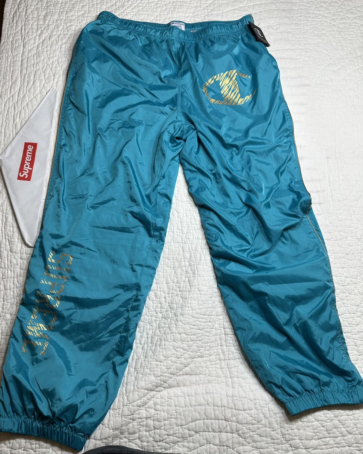 Champion Supreme NEW Supreme Champion Track Pants Windbreaker Sweatpants XL Grailed