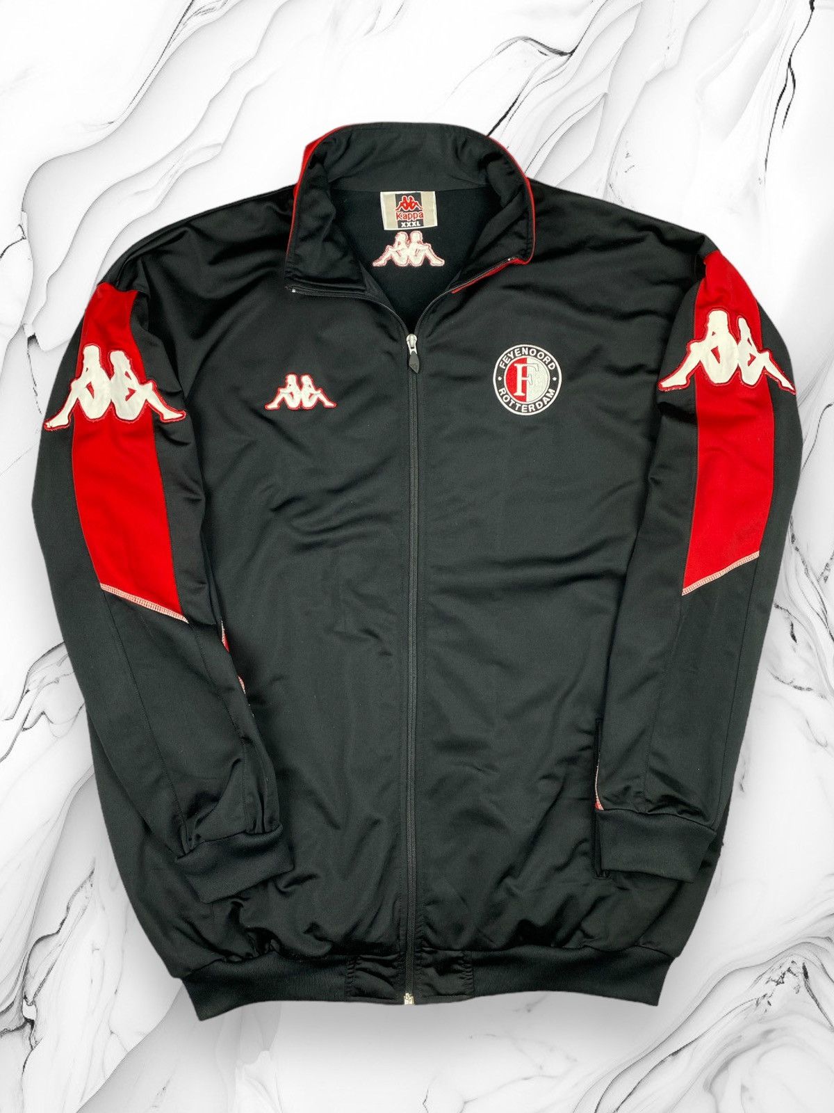 A large selection of football shirts from Feyenoord Rotterdam