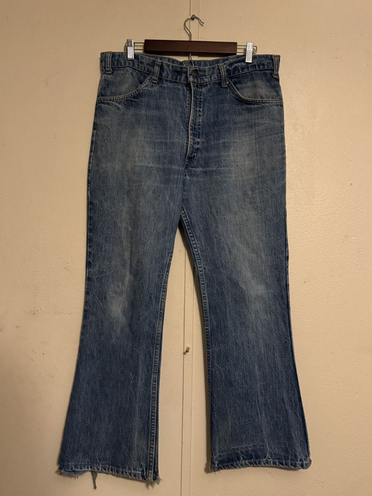 ORANGE TAB FLARE LEVI’S