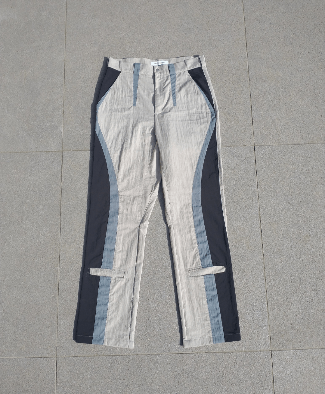 image of Kiko Kostadinov Jethra Trousers in Beige, Men's (Size 30)