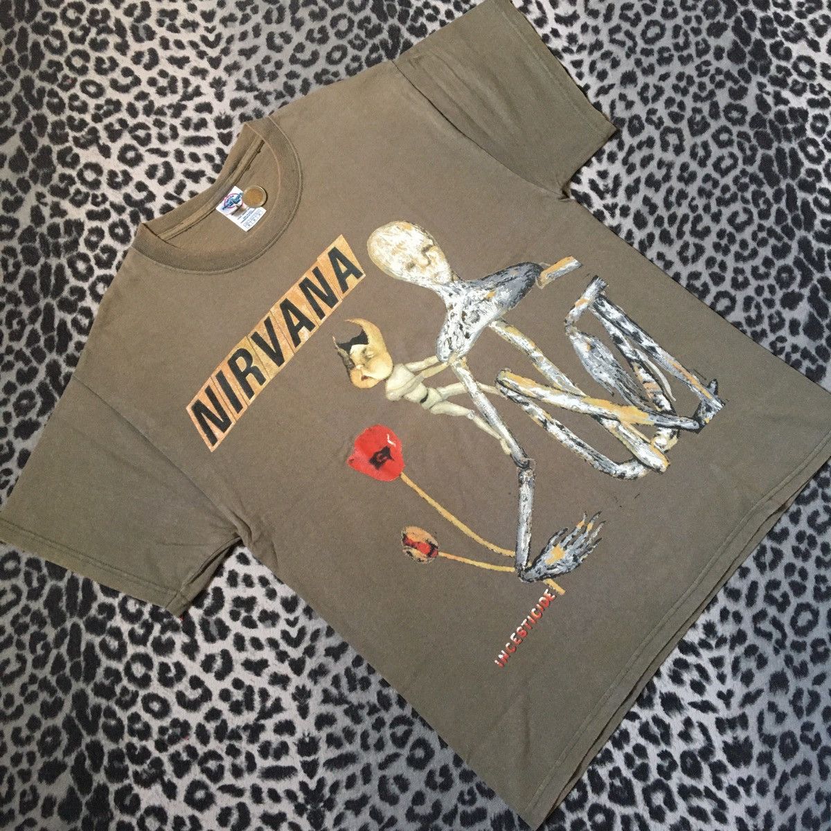 image of Kurt Cobain x Nirvana Vintage Nirvana Incesticide in Green, Men's (Size Medium)