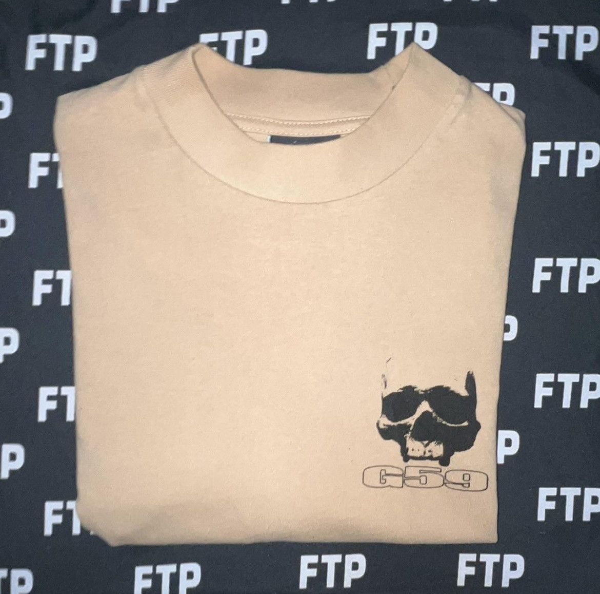G59 Records G59 LOGO TEE (TAN) Size US M / EU 48-50 / 2 - 1 Thumbnail