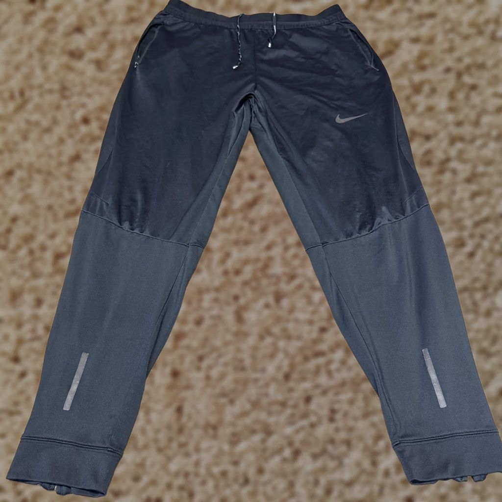 Nike Nike Shield Track Pants Mens Large Black Elastic Waist Reflective Zip Pockets Size US 33 - 1 Thumbnail