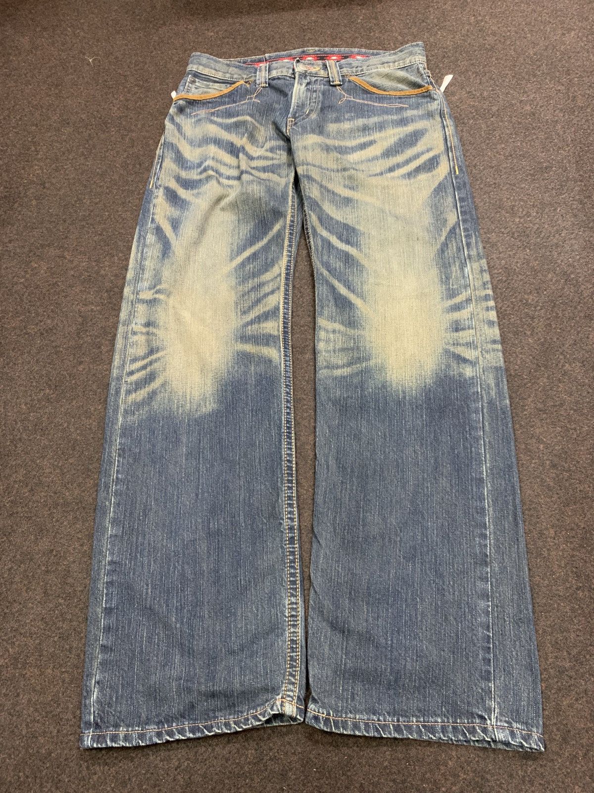Edwin Blue Trip Faded Whiskers Denim Jeans.