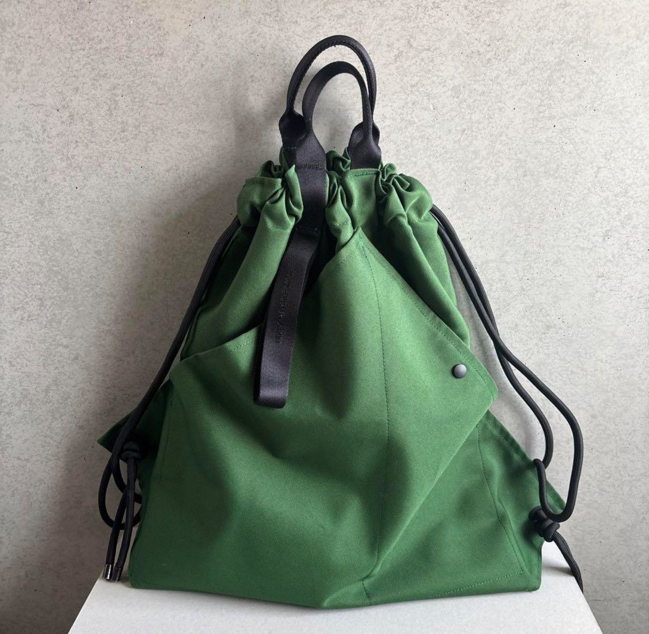 Issey Miyake × Japanese Brand ISSEY MIYAKE MEN KINCHAKU Napsack Backpack Green Size ONE SIZE - 1 Thumbnail