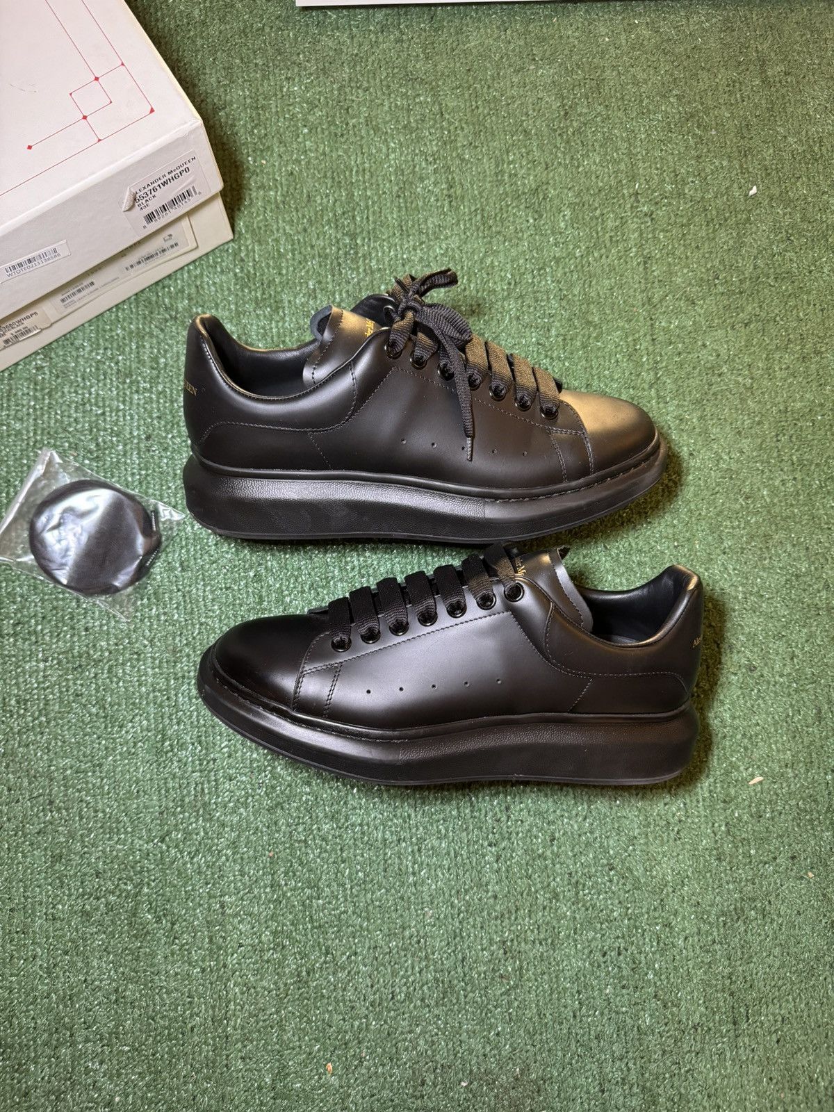 Alexander McQueen  Designer Alexander McQueen Oversized Sneakers All Black  Gold logo | Grailed