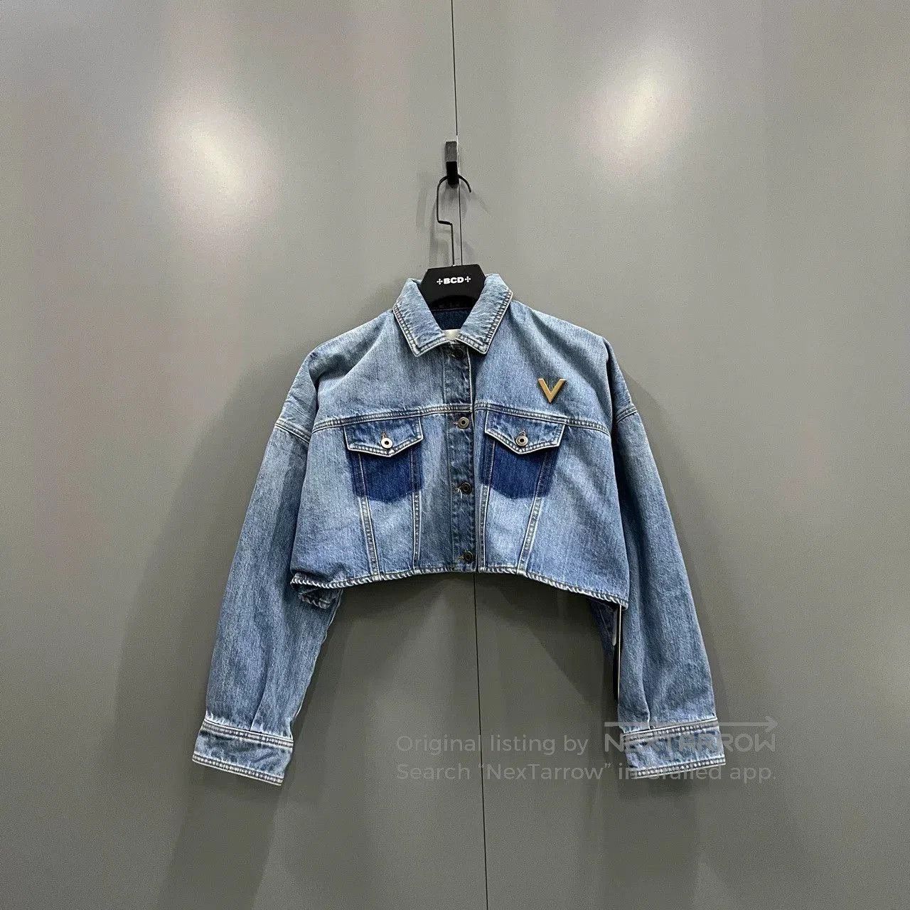valentino cropped denim jacket with metal v.