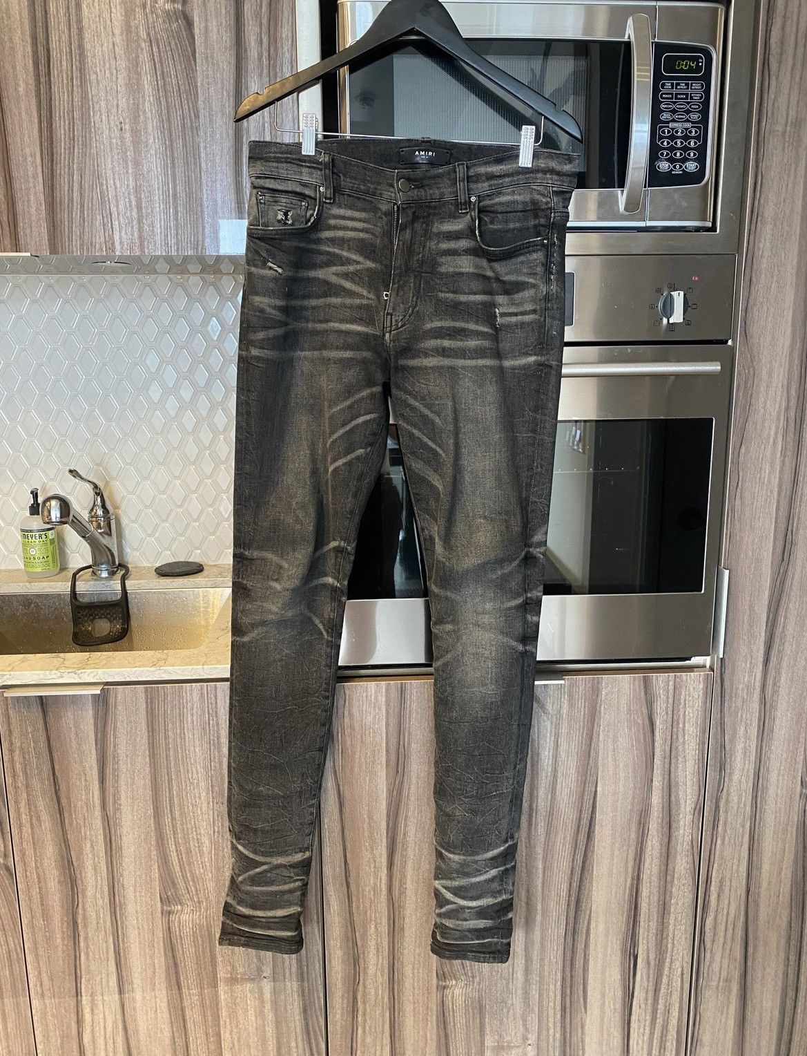 Image of Amiri Washed Denim Jeans in Grey, Men's (Size 31)