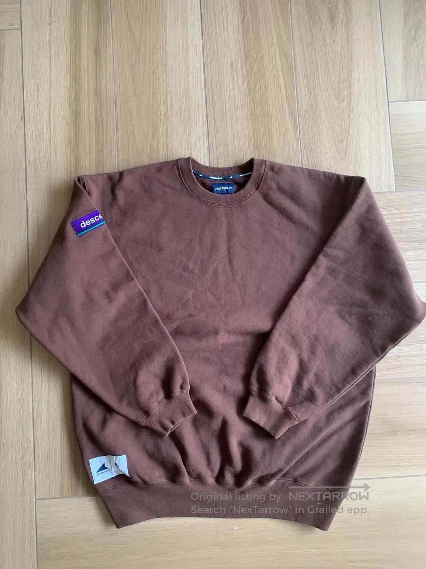 descendant crew neck sweatshirt with embroidery.