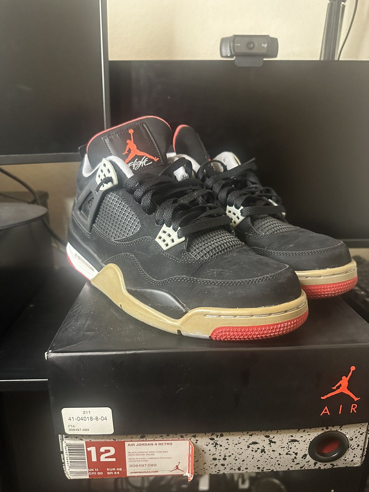 image of Jordan Nike Air Jordan 4 "bred" Shoes in Black, Men's (Size 12)