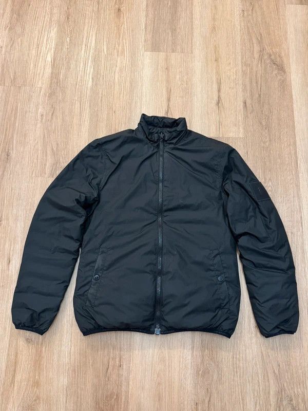 Peak Performance Peak Performance Troop Down Jacket Reversible size S Size US S / EU 44-46 / 1 - 2 Thumbnail