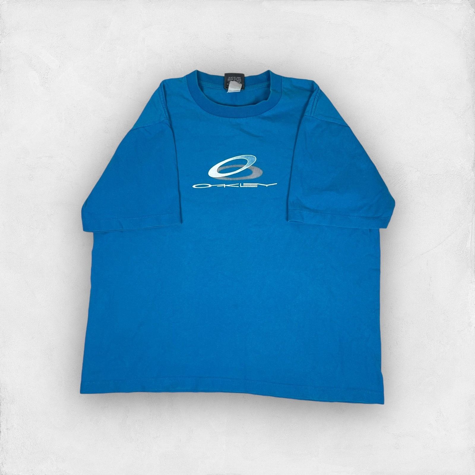 Oakley × Vintage Oakley Men's Blue Cotton Crew Neck Graphic Pullover T-Shirt Size US S / EU 44-46 / 1 - 1 Thumbnail