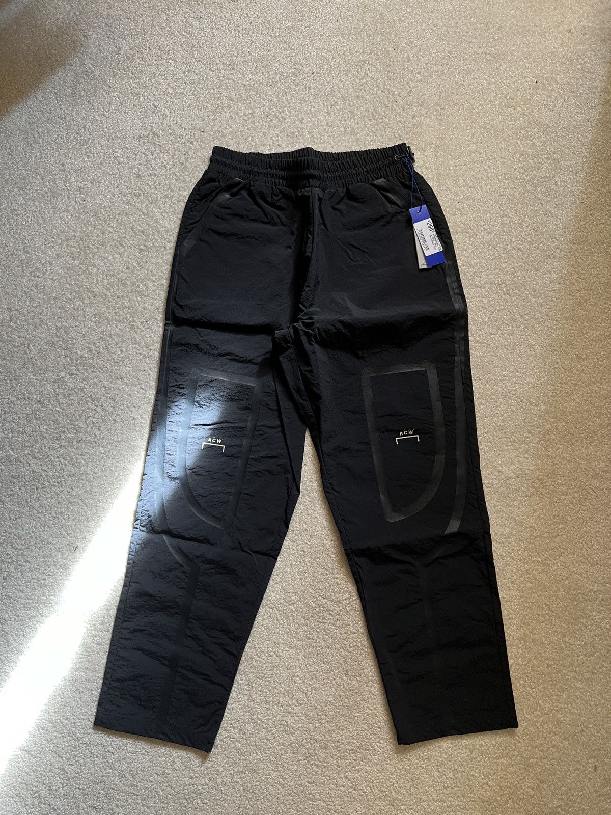 image of A Cold Wall Taped Track Pants in Black, Men's (Size 28)