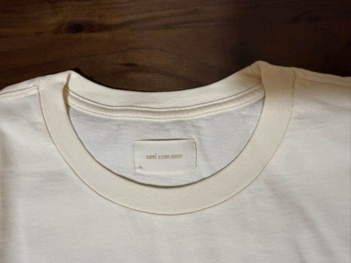 Aime Leon Dore Aime Leon Dore ALD Cycling Logo Tee in Pristine (Cream) XL Size US XL / EU 56 / 4 - 3 Thumbnail