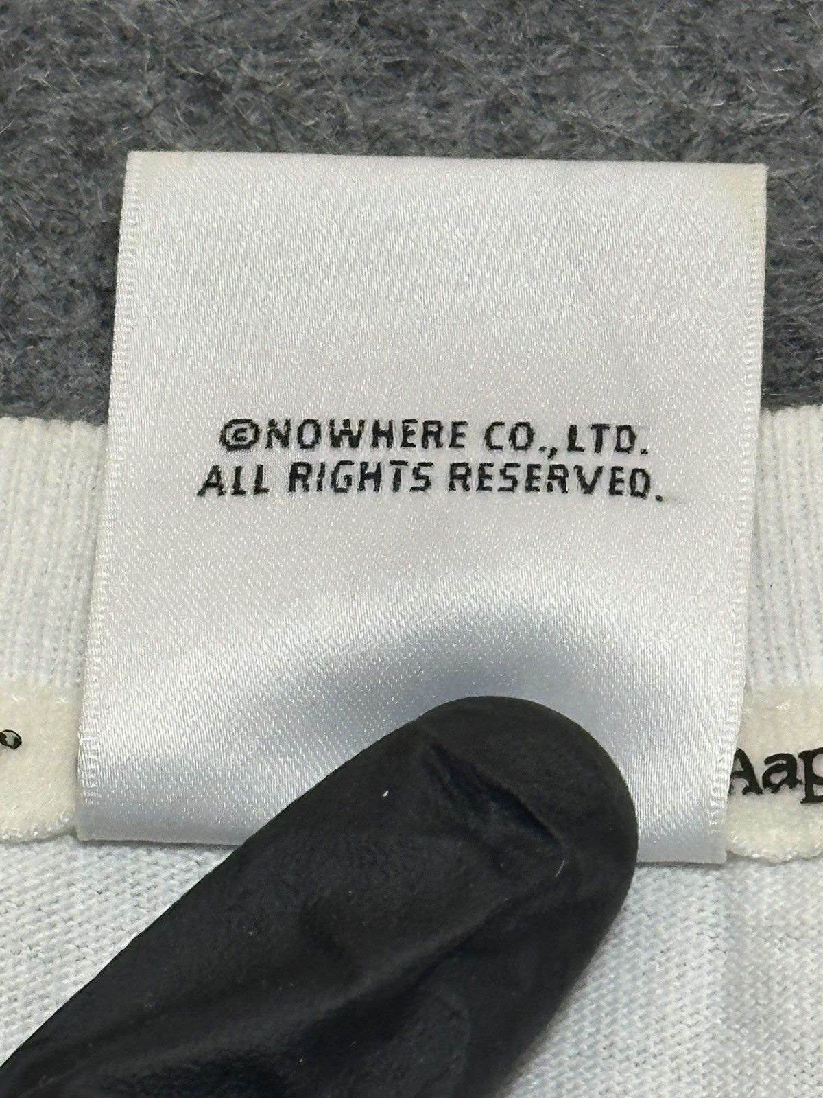 Aape AAPE by A Bathing Ape Moon Face Camo T-shirt in white. Size US M / EU 48-50 / 2 - 8 Thumbnail