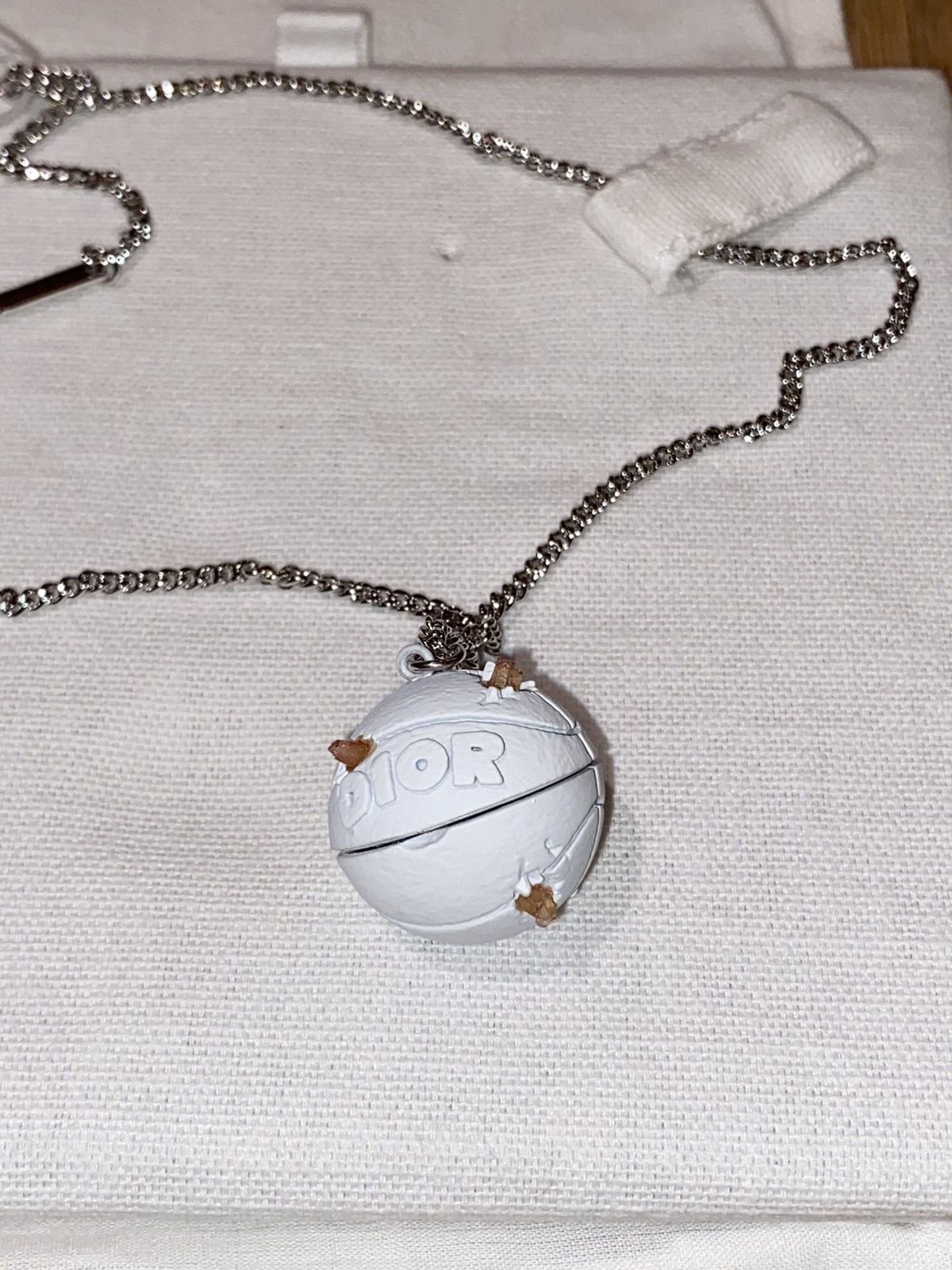 Daniel Arsham × Dior Dior x Daniel Arsham Eroded Basketball Pendant  Necklace | Grailed