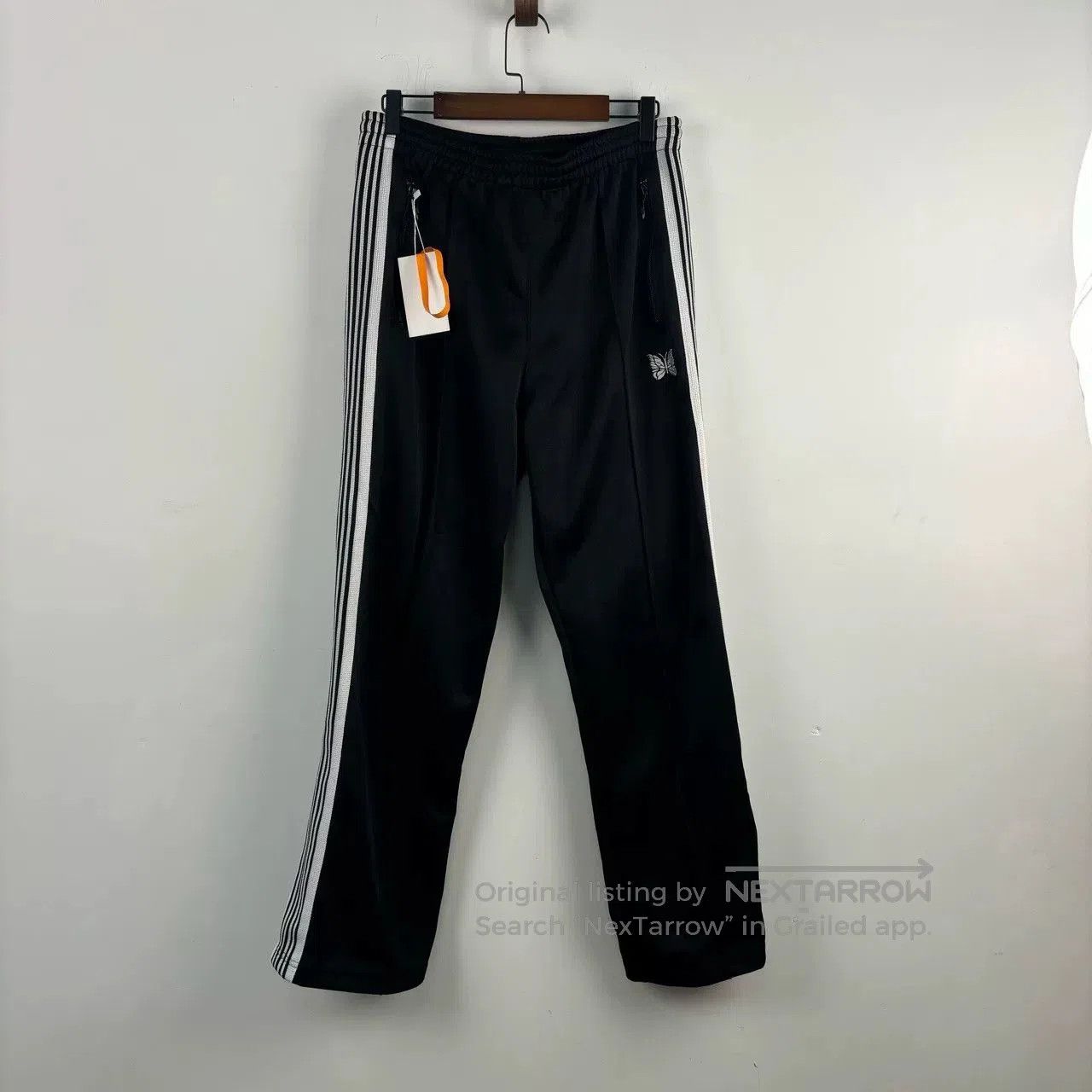 black striped side pants by Needles.