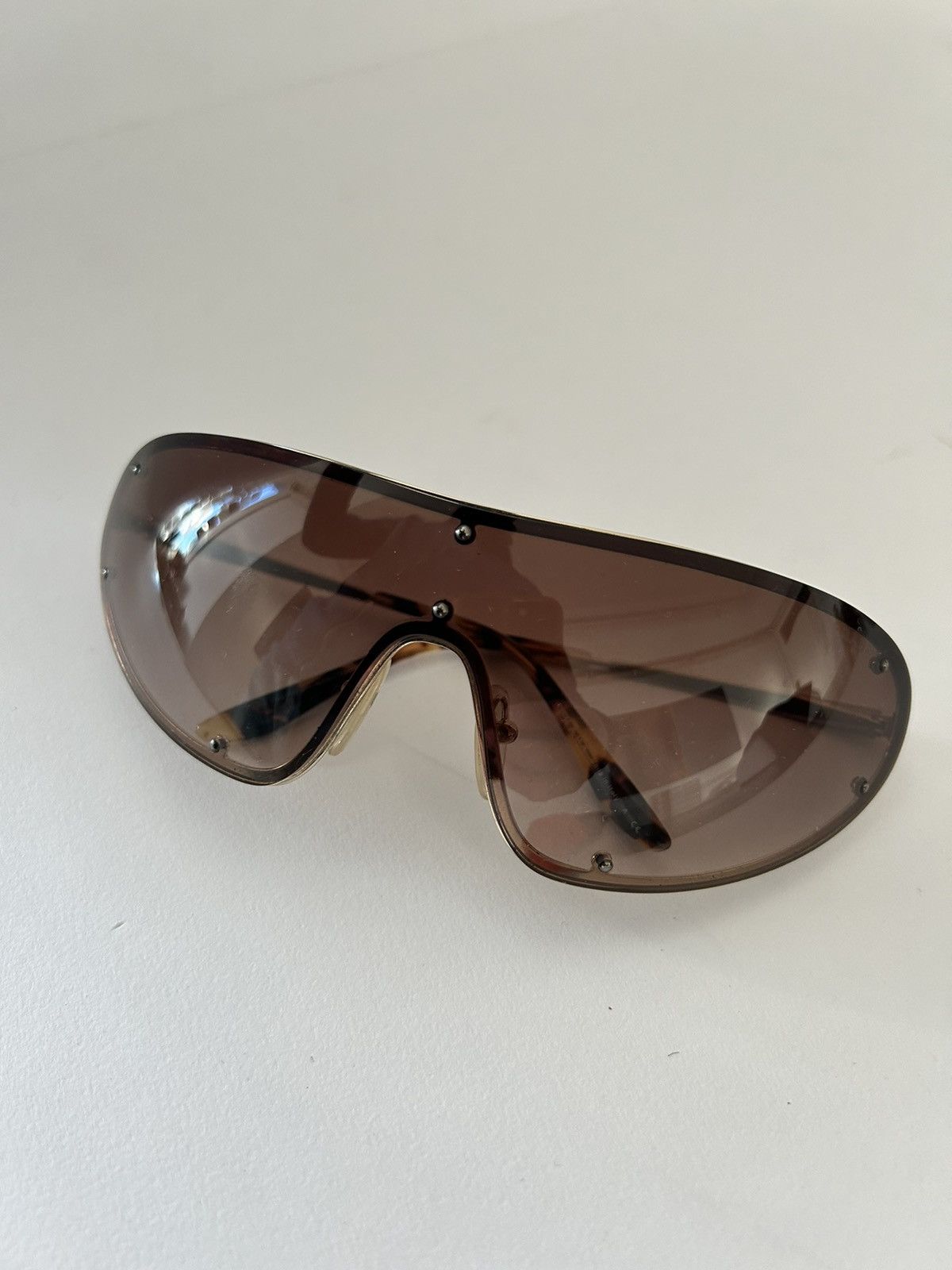 Prada Prada wrap around sunglasses tortoiseshell arms Size ONE SIZE - 2 Thumbnail