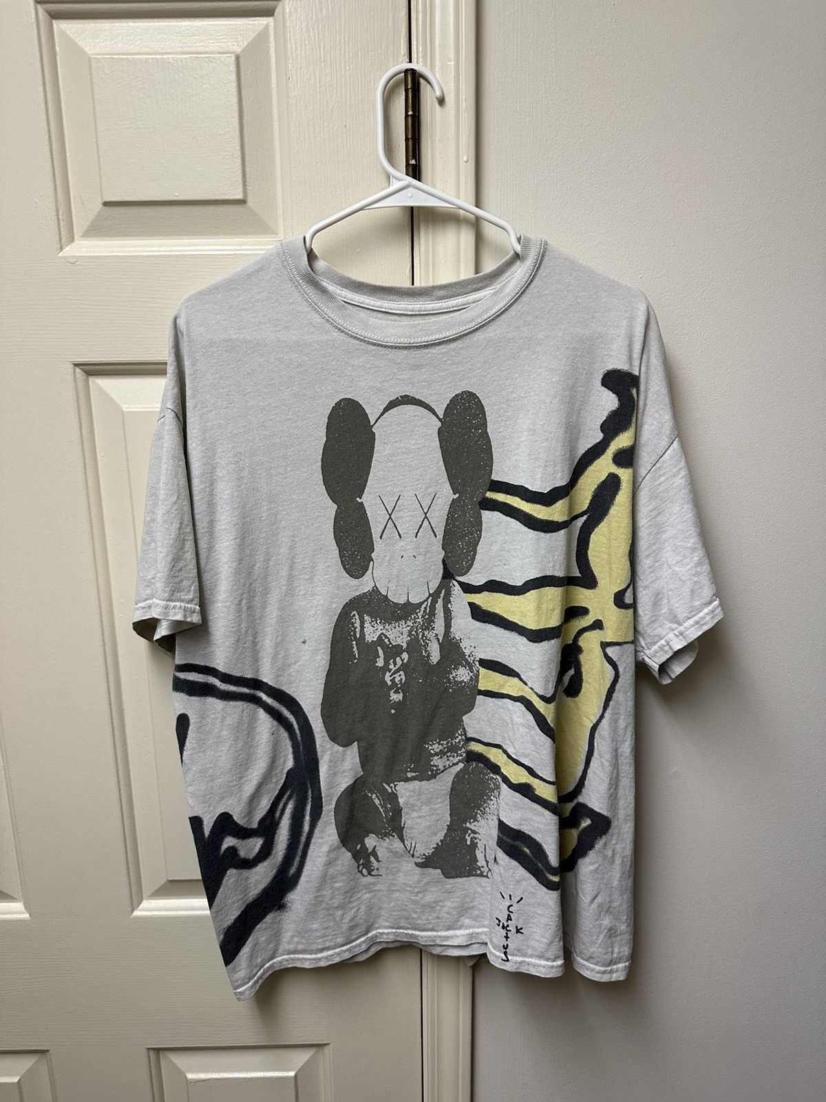 travis kaws tee