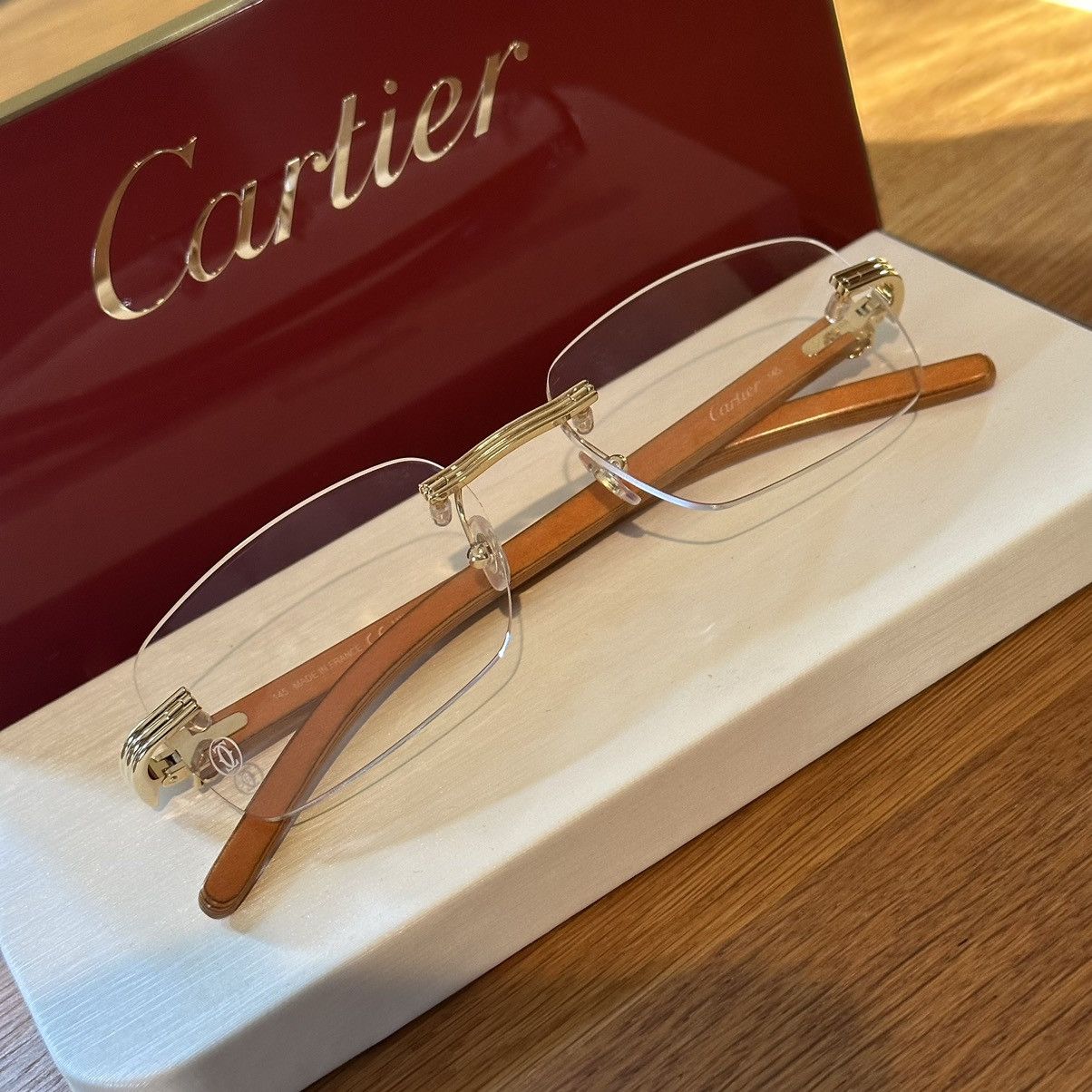 Cartier CT0286O FW23 Orange Wood Rimless Glasses | Grailed