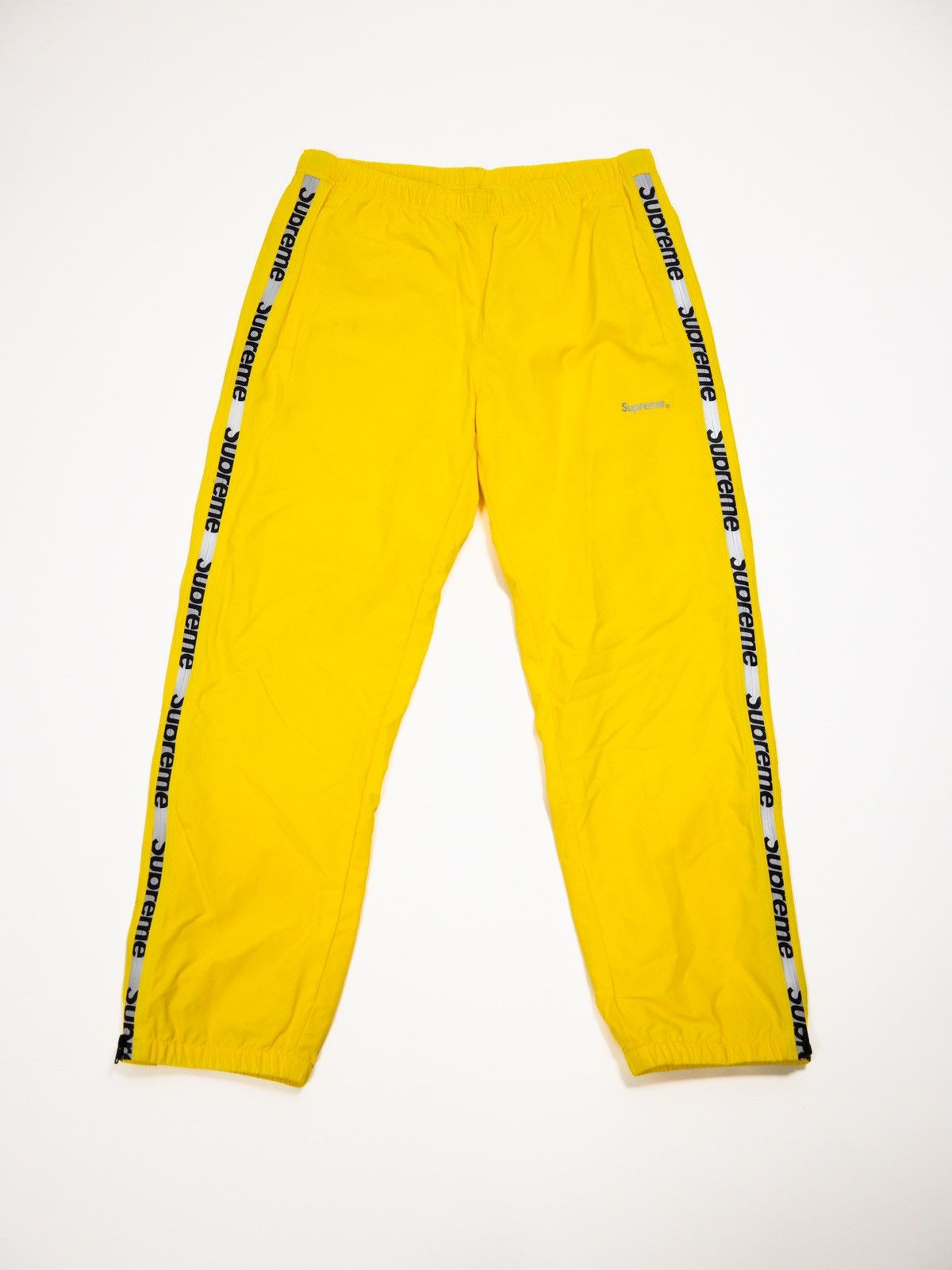 supreme reflective zip track pant