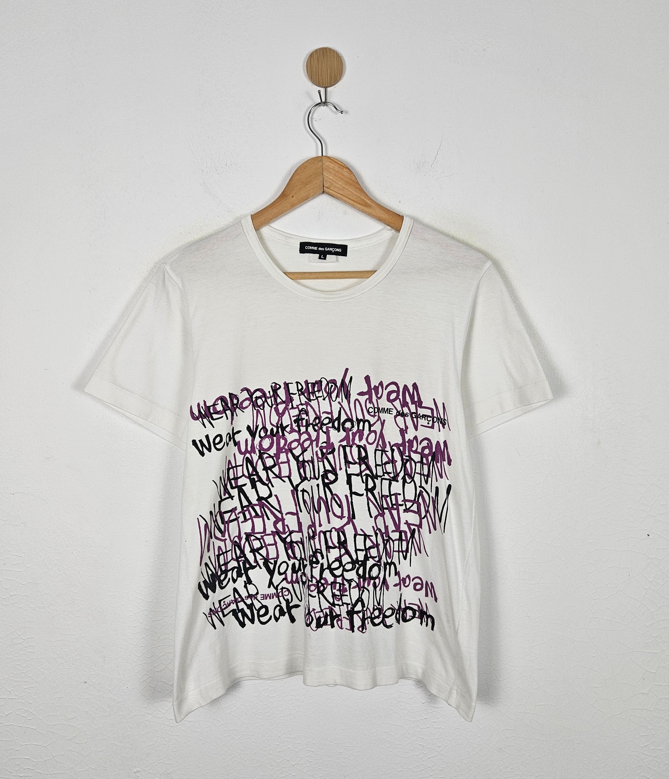 COMME des GARÇONS 長袖T wear your freedom COMME des GARÇONS 長袖T wear your freedom
