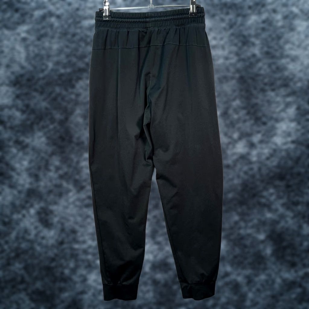 Uniqlo Uniqlo Mens Small Black Ultra Stretch Jogger Pants Drawstring Slim Tapered Pockets Solid 28in Inseam Regular Fit Casual Shoes? Size US 29 - 1 Thumbnail