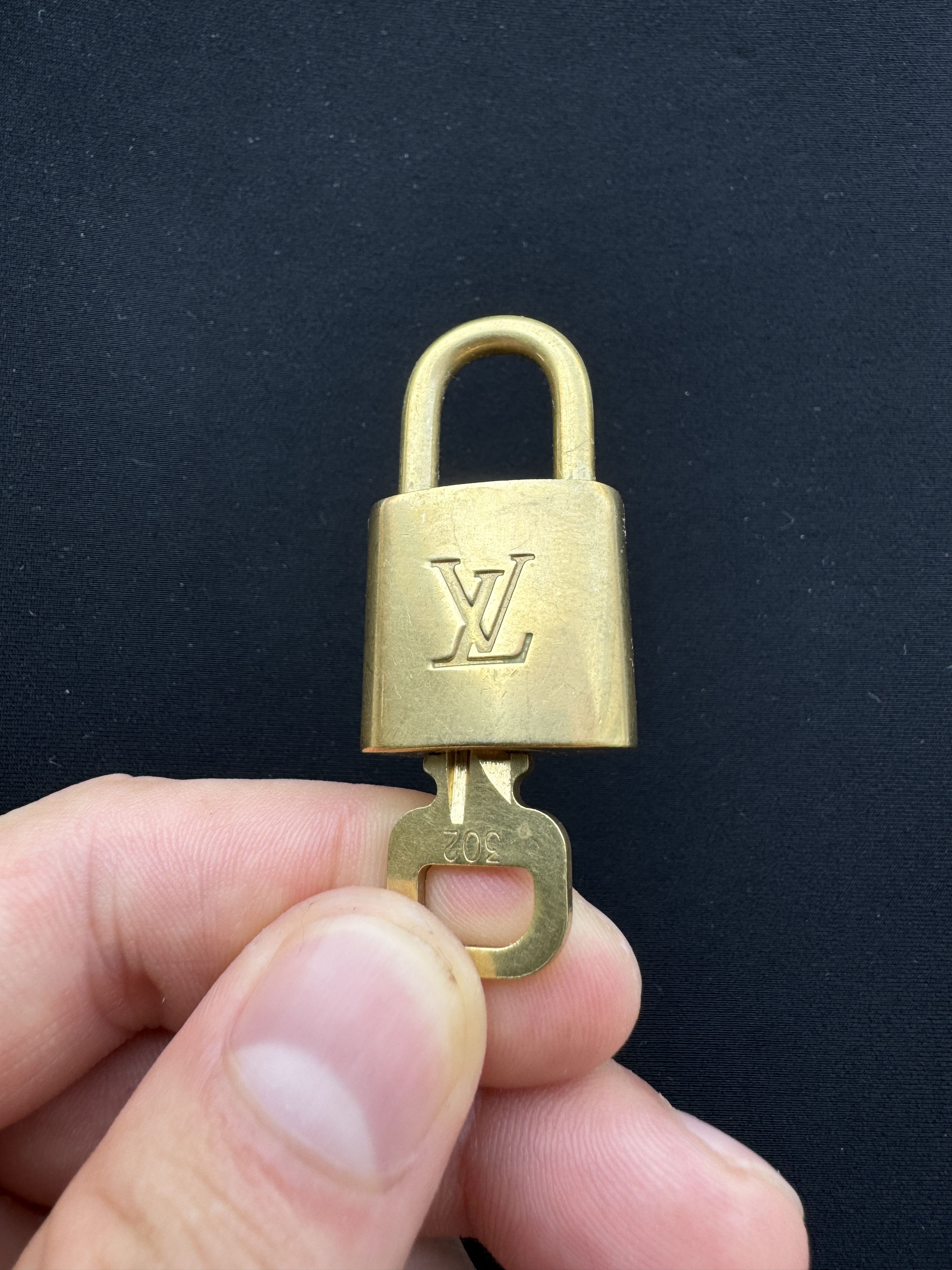 Louis Vuitton Vintage Louis Vuitton 302 lock with key #208 | Grailed