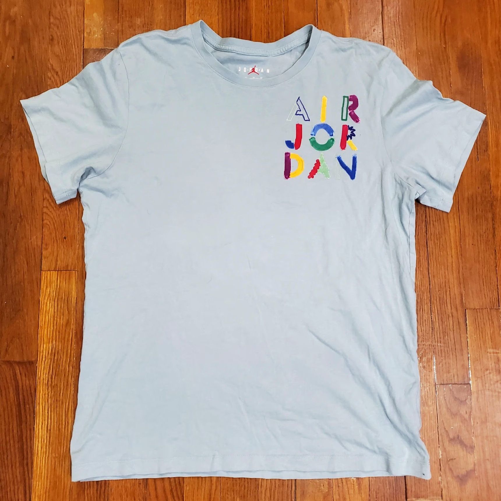Jordan Brand Air Jordan Shirt Mens XL Blue Colorful Art The Cradle Basketball Nike DM3078-366 Size US XL / EU 56 / 4 - 4 Thumbnail