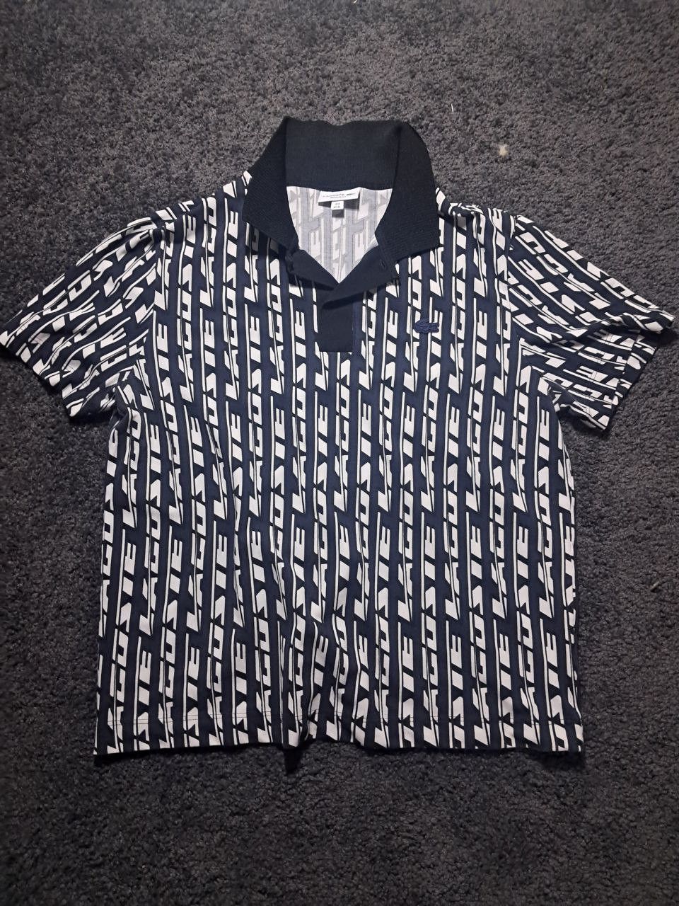 Lacoste Full name: Men’s Navy & White Geometric Print Polo Size US XL / EU 56 / 4 - 5 Thumbnail