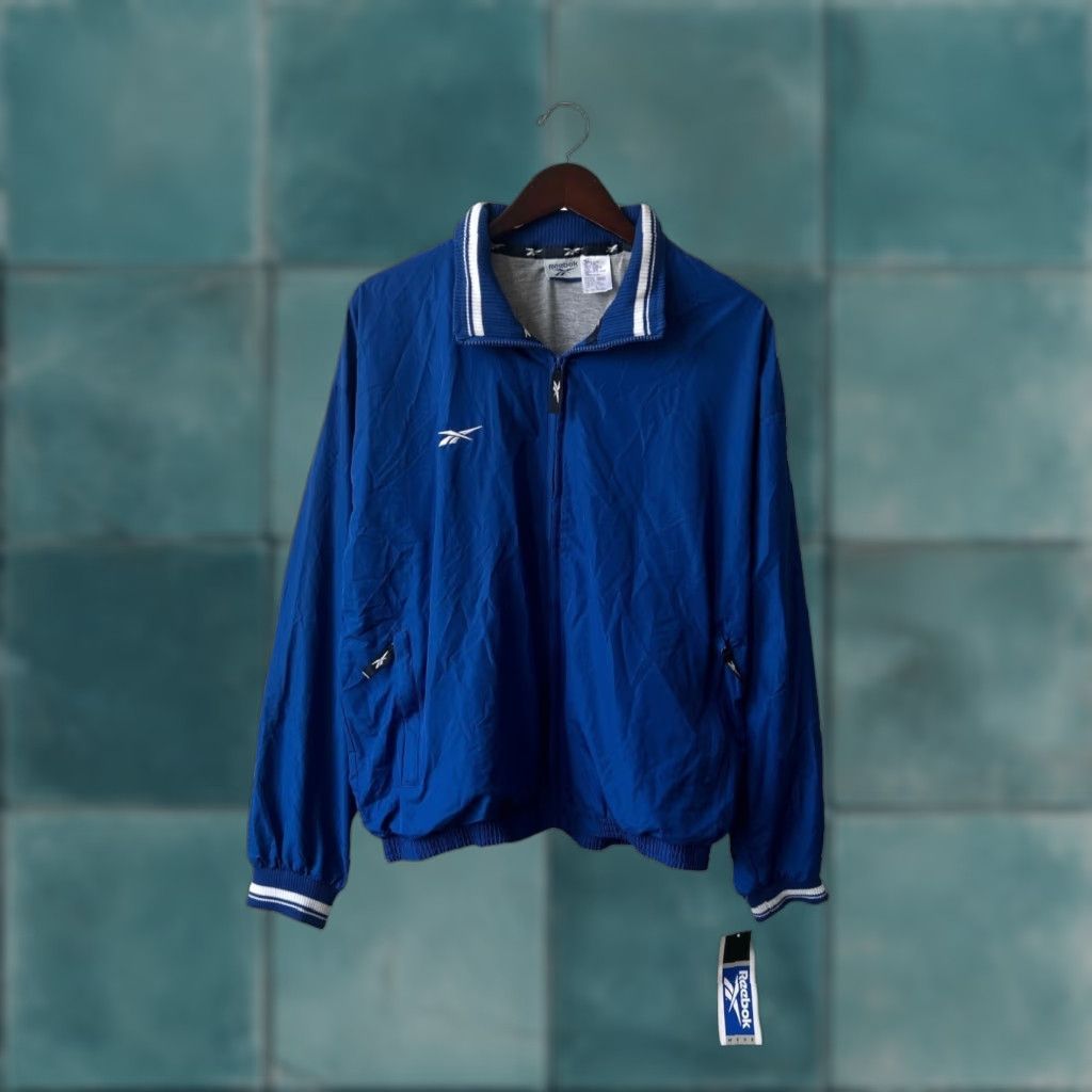 VINTAGE Reebok Windbreaker Lightweight Jacket Mens Large Blue 90s NWT Deadstock 1996 Zip Pocket Embroidered Logo Chest