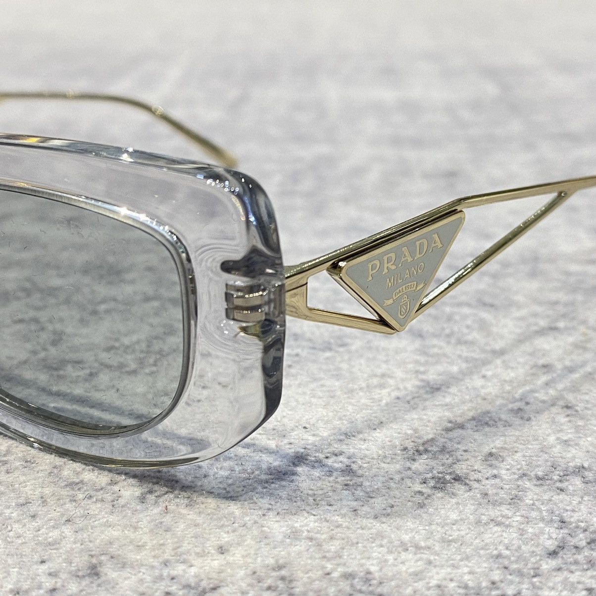 PRADA 0PR 14YS 12R50K TRANSPARENT GREY