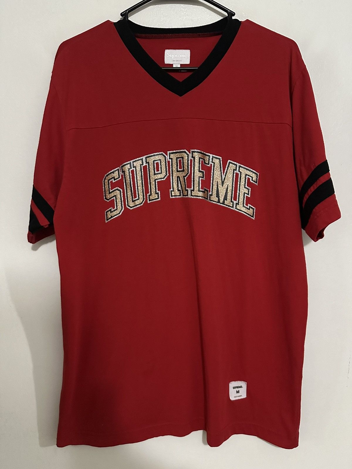 シュプリーム SUPREME Glitter Arc Football Top Supreme Glitter Arc Football Top (FW17) - $88