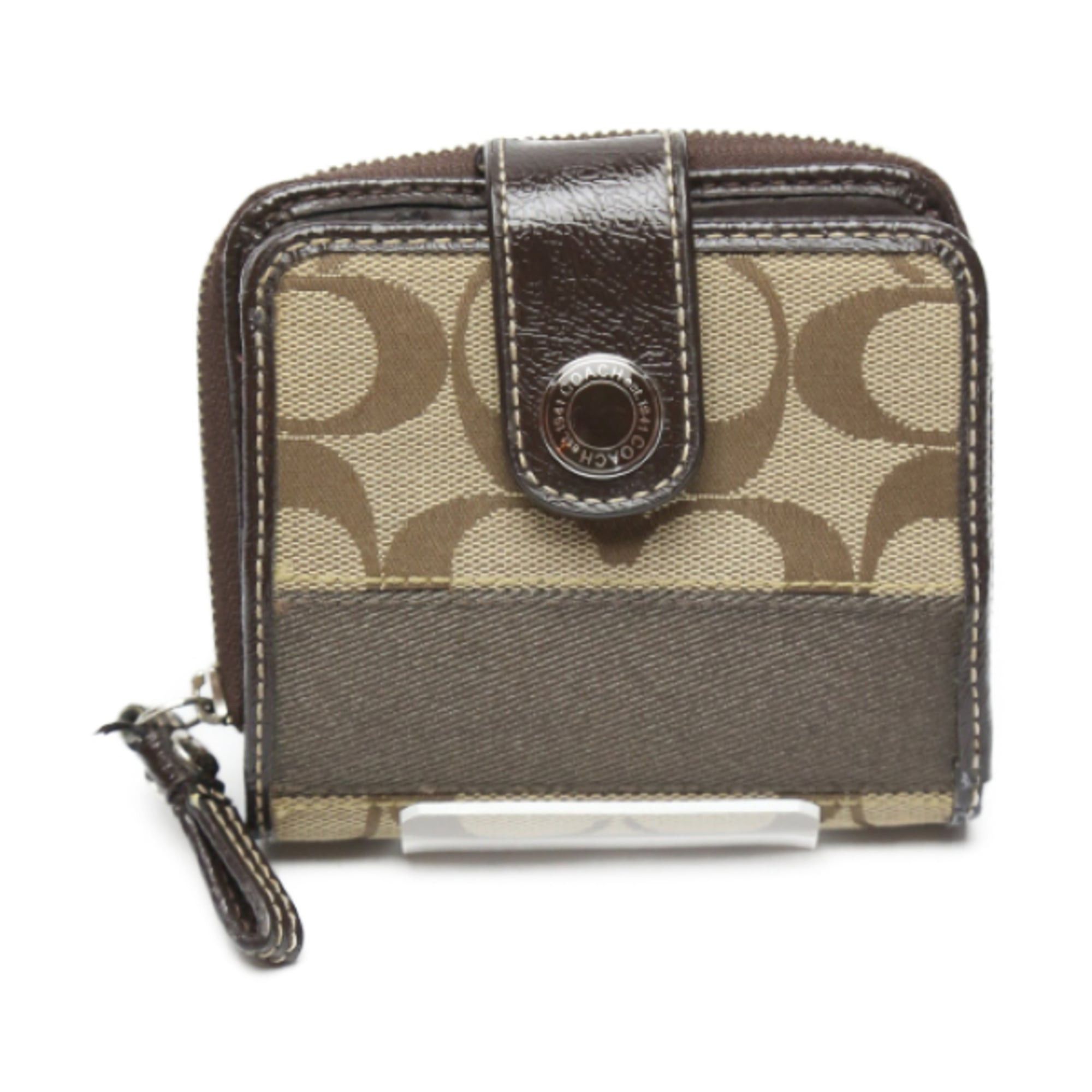 Coach Coach bifold wallet in signature canvas and patent leather with a round zipper, brown Size ONE SIZE - 1 Thumbnail