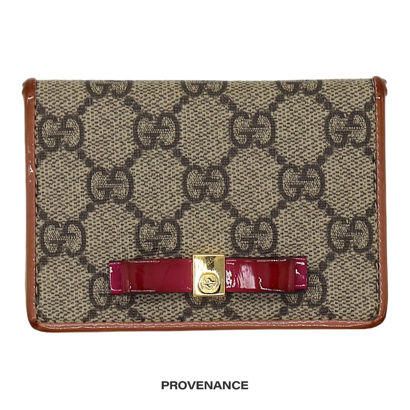 image of Gucci GG Supreme Bow Pocket Organizer Wallet - Hot Orange, Women's