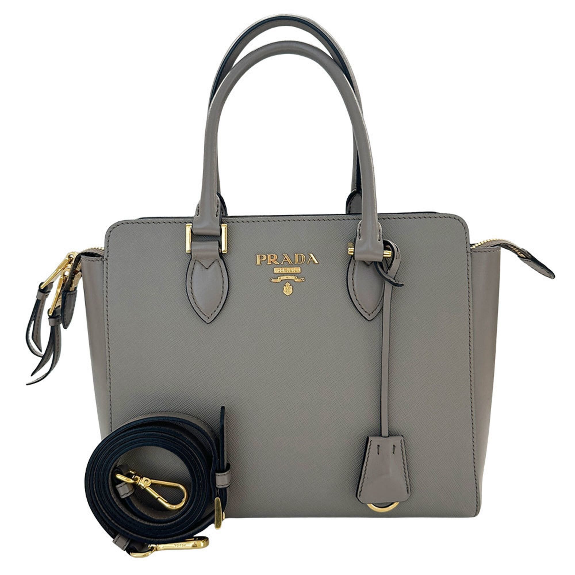 Prada Prada handbag for women, brand name, handbag/shoulder bag, 2-way, Saffiano leather, gray, 1BA113, can be carried by hand or on the shoulder. Size ONE SIZE - 1 Thumbnail