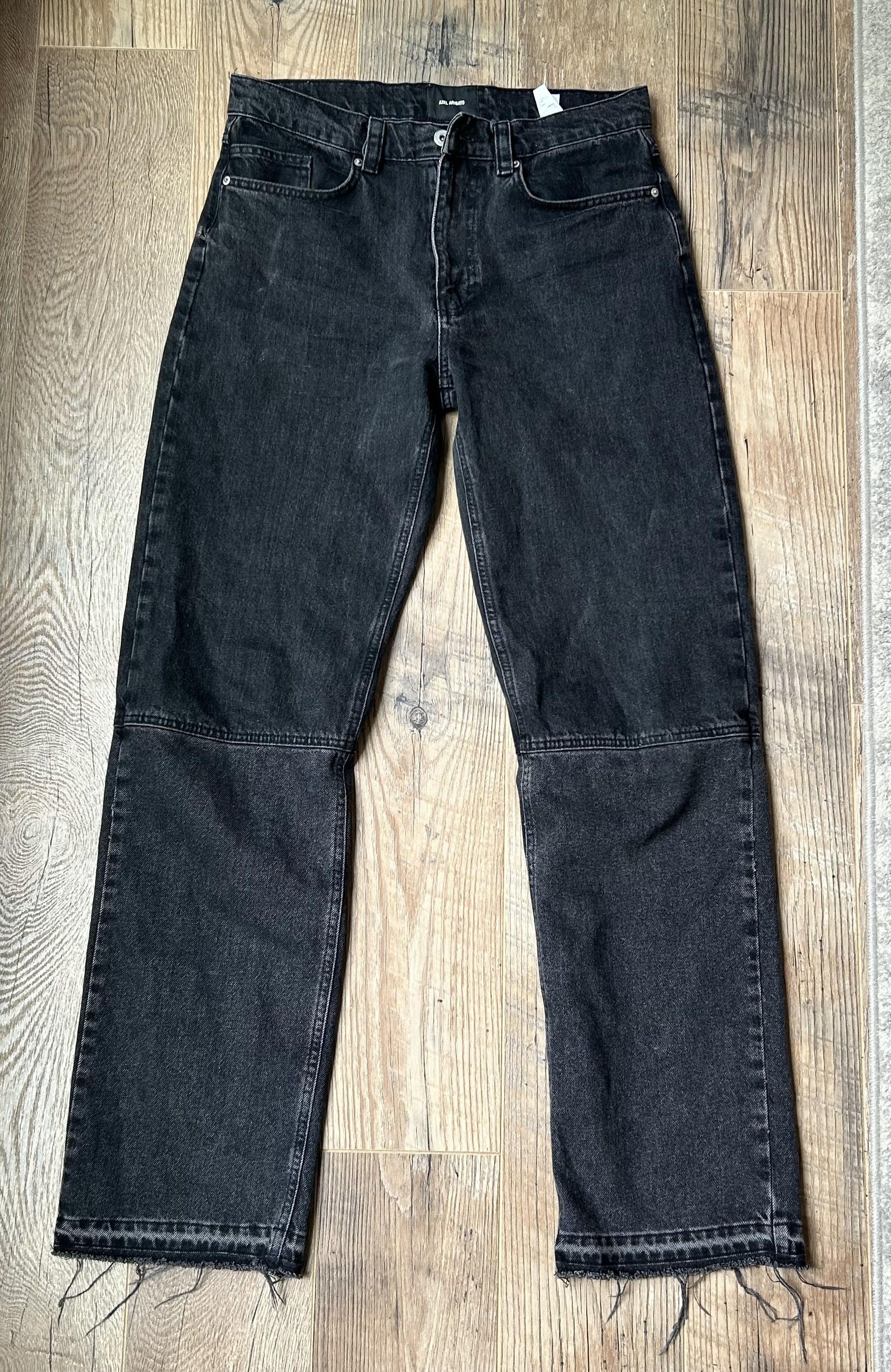 image of Axel Arigato Wide Leg Released Hem Denim in Black, Men's (Size 31)