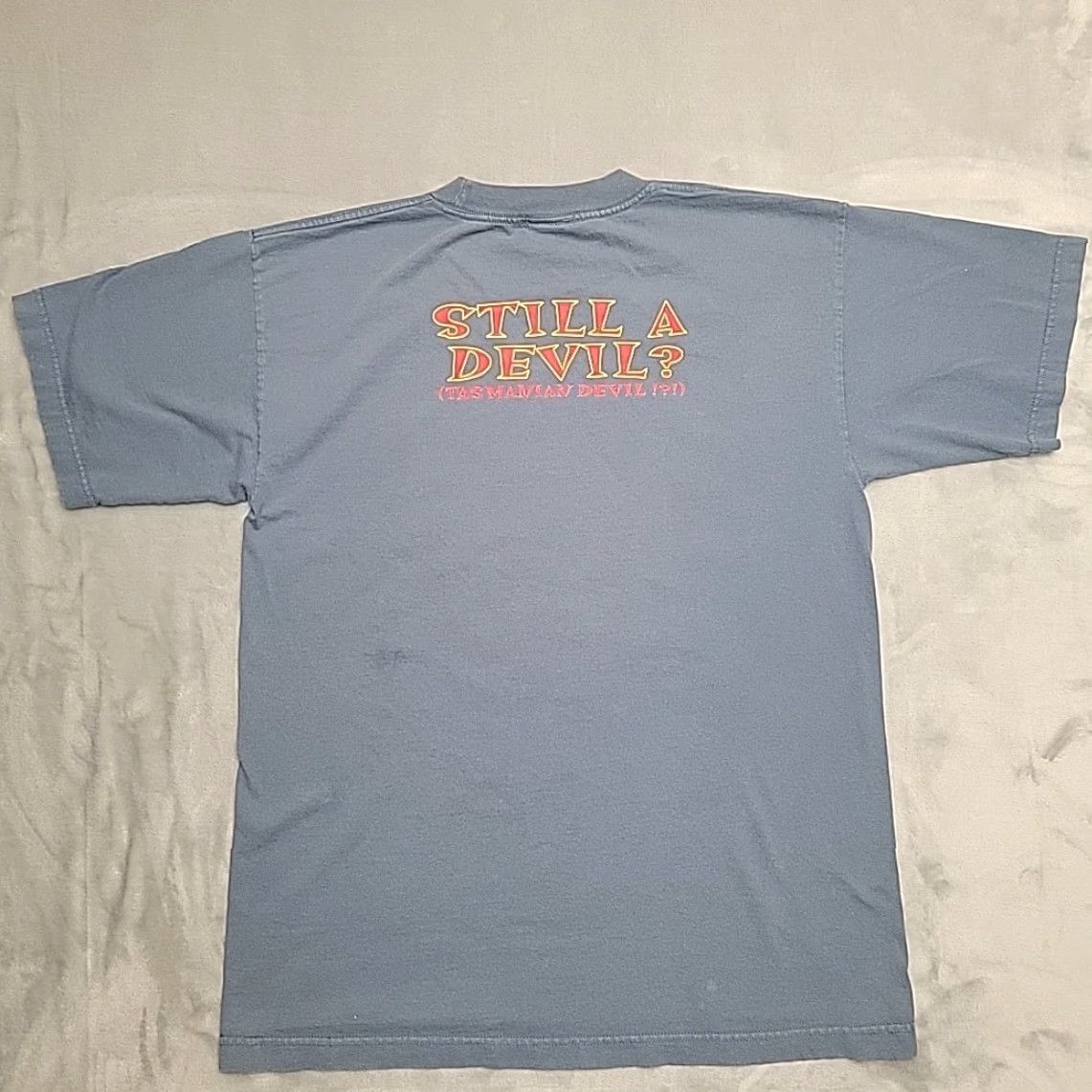 Vintage VINTAGE Looney Tunes Tee Mens L Blue Taz Devil Angel 90s Cartoon Retro 1998 Tee Mens L Blue Taz Devil Angel 90s Cartoon Retro 1998 Size US L / EU 52-54 / 3 - 5 Thumbnail