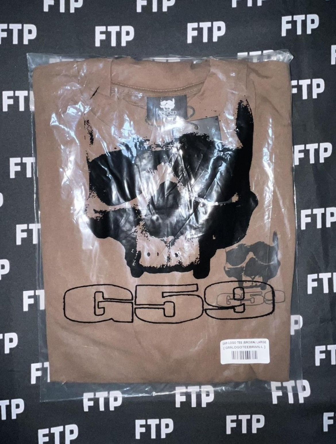 G59 Records G59 Logo tee (Brown) Size US L / EU 52-54 / 3 - 1 Thumbnail
