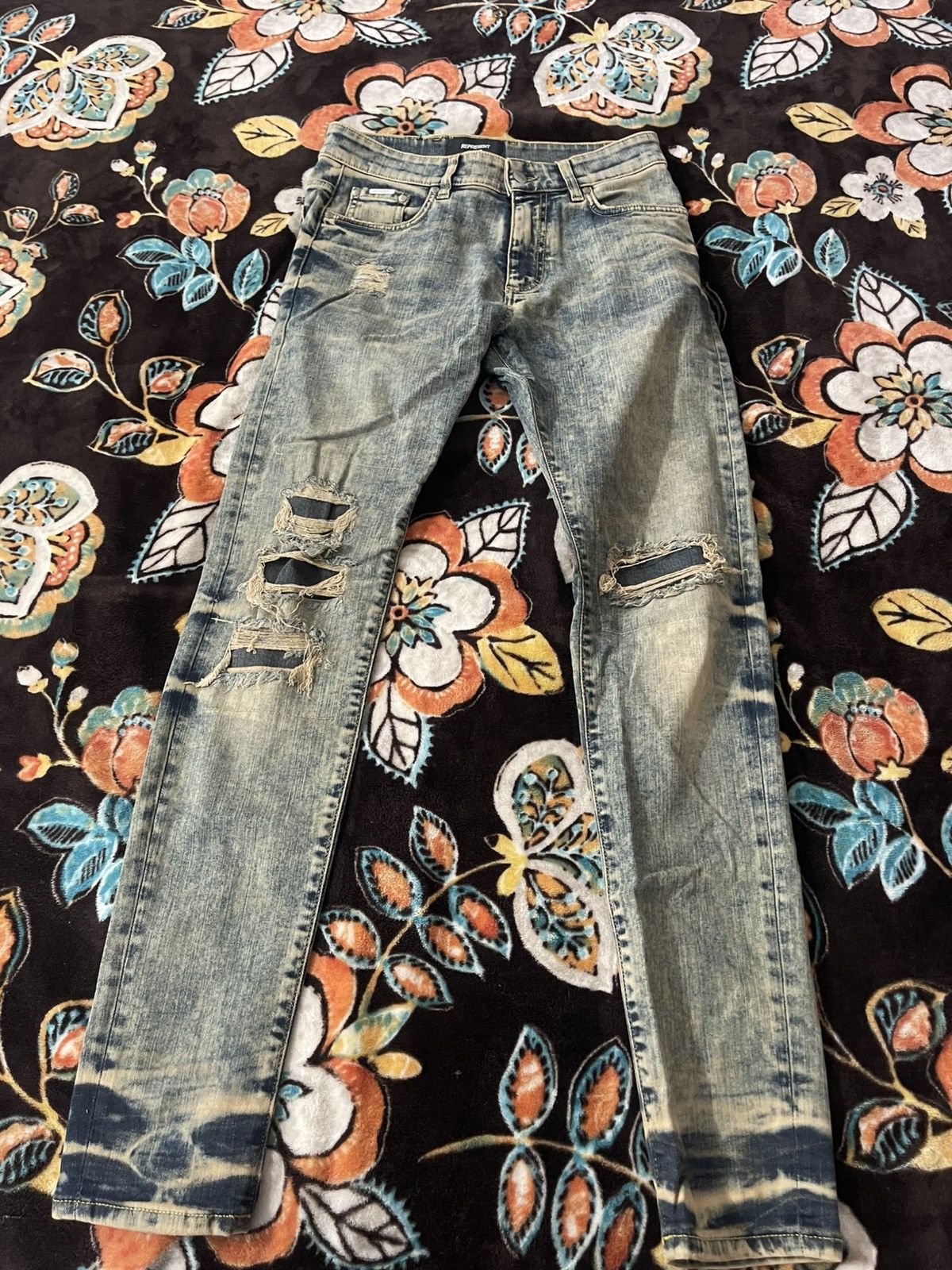 Distressed dirty indigo skinny jeans